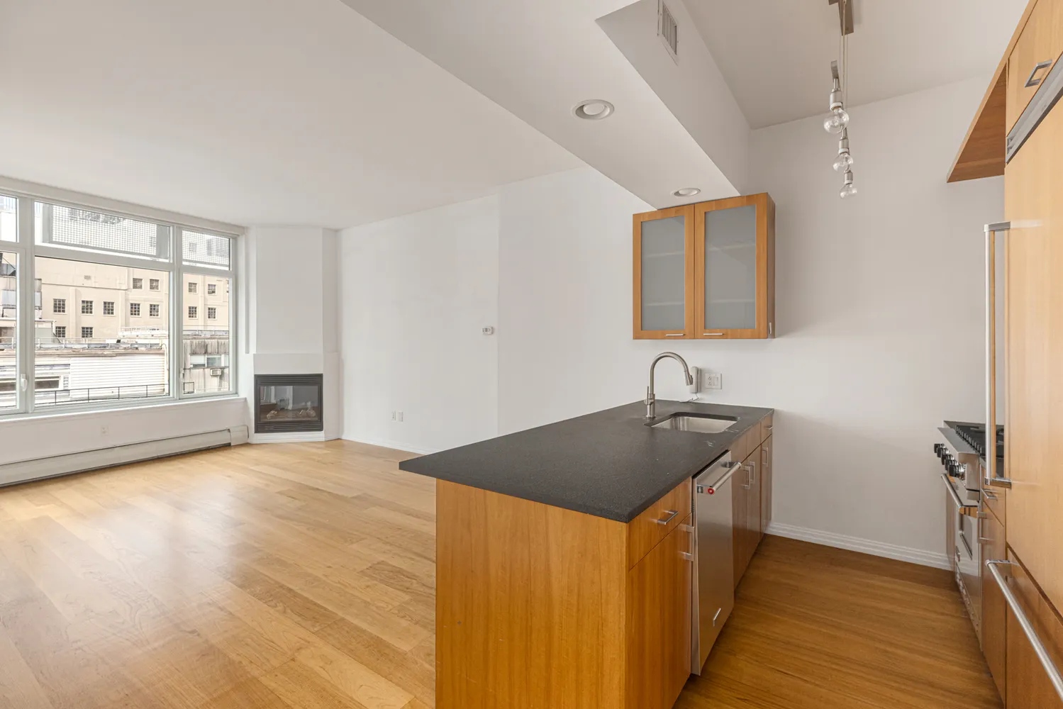 a kitchen with sink and window
