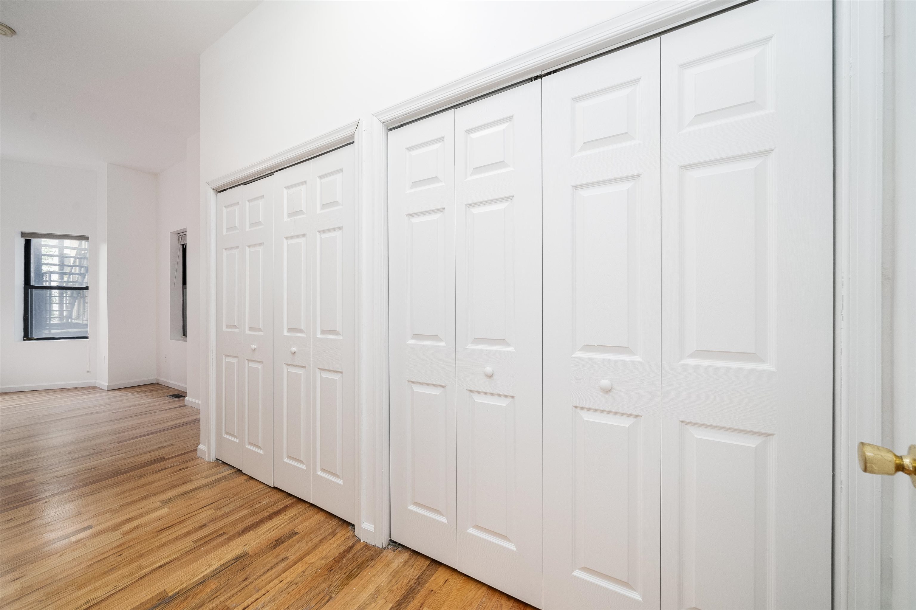 639 Garden Street, Unit 1 Hoboken, NJ 07030 - Photo 12 of 17 a view of a livingroom with wooden floor