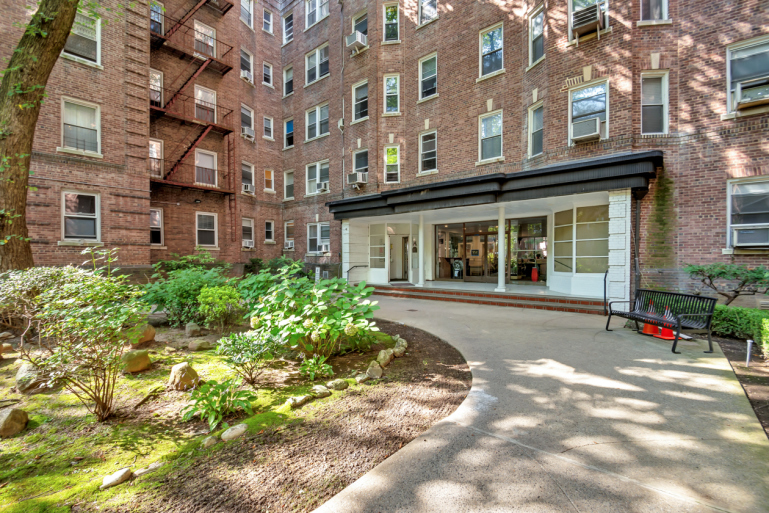 1615 Avenue I, Unit 603 Brooklyn, NY 11230 - Photo 12 of 13 a view of a building with a garden