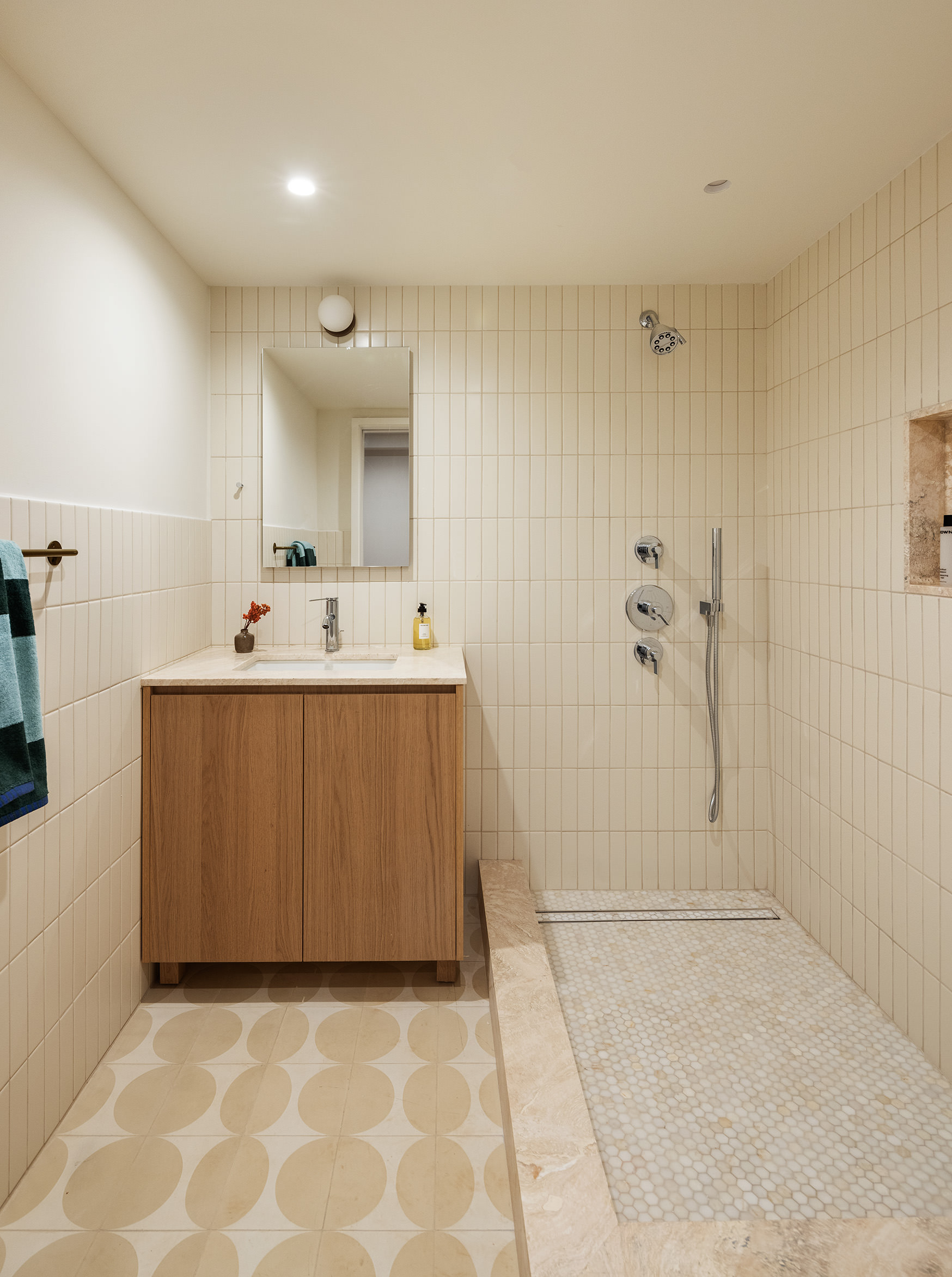 238 Degraw Street, Unit 1 Brooklyn, NY 11231 - Photo 9 of 13 a bathroom with a sink a mirror and shower