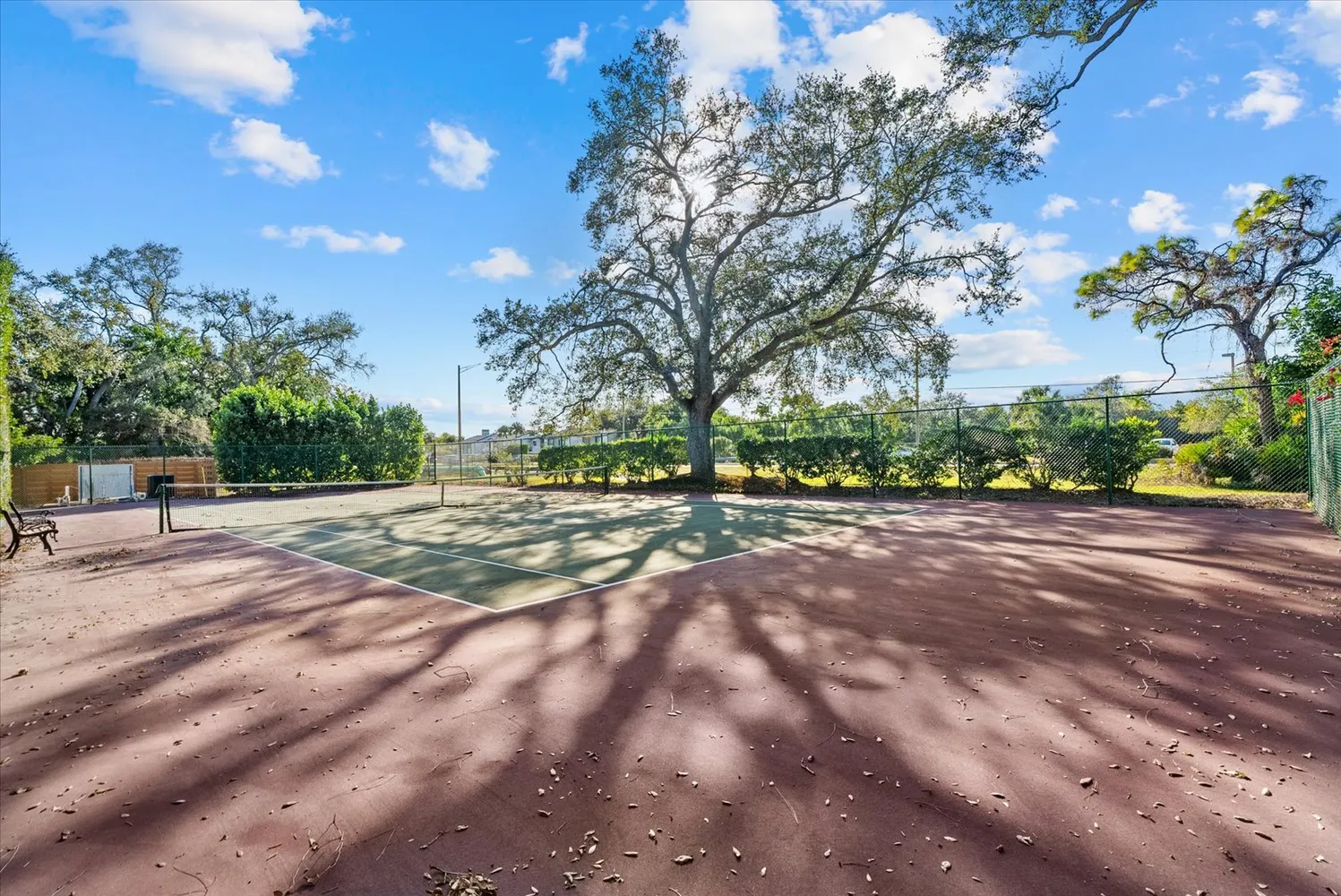 a view of a swimming pool with a patio