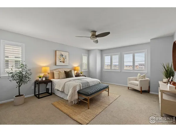 a bathroom with a granite countertop sink mirror and double