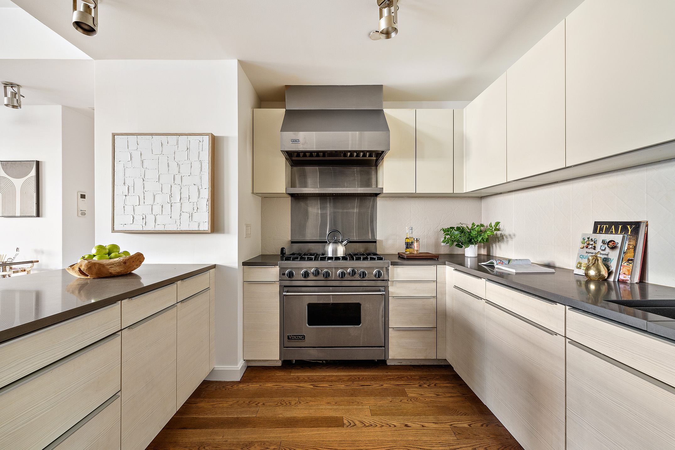 41 Warren Street, Unit 6 Manhattan, NY 10007 - Photo 7 of 23 a kitchen with a stove and a sink