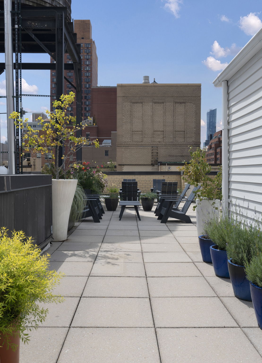 136 East 36th Street, Unit 5D Manhattan, NY 10016 - Photo 8 of 13 a view of a terrace with chairs potted plants