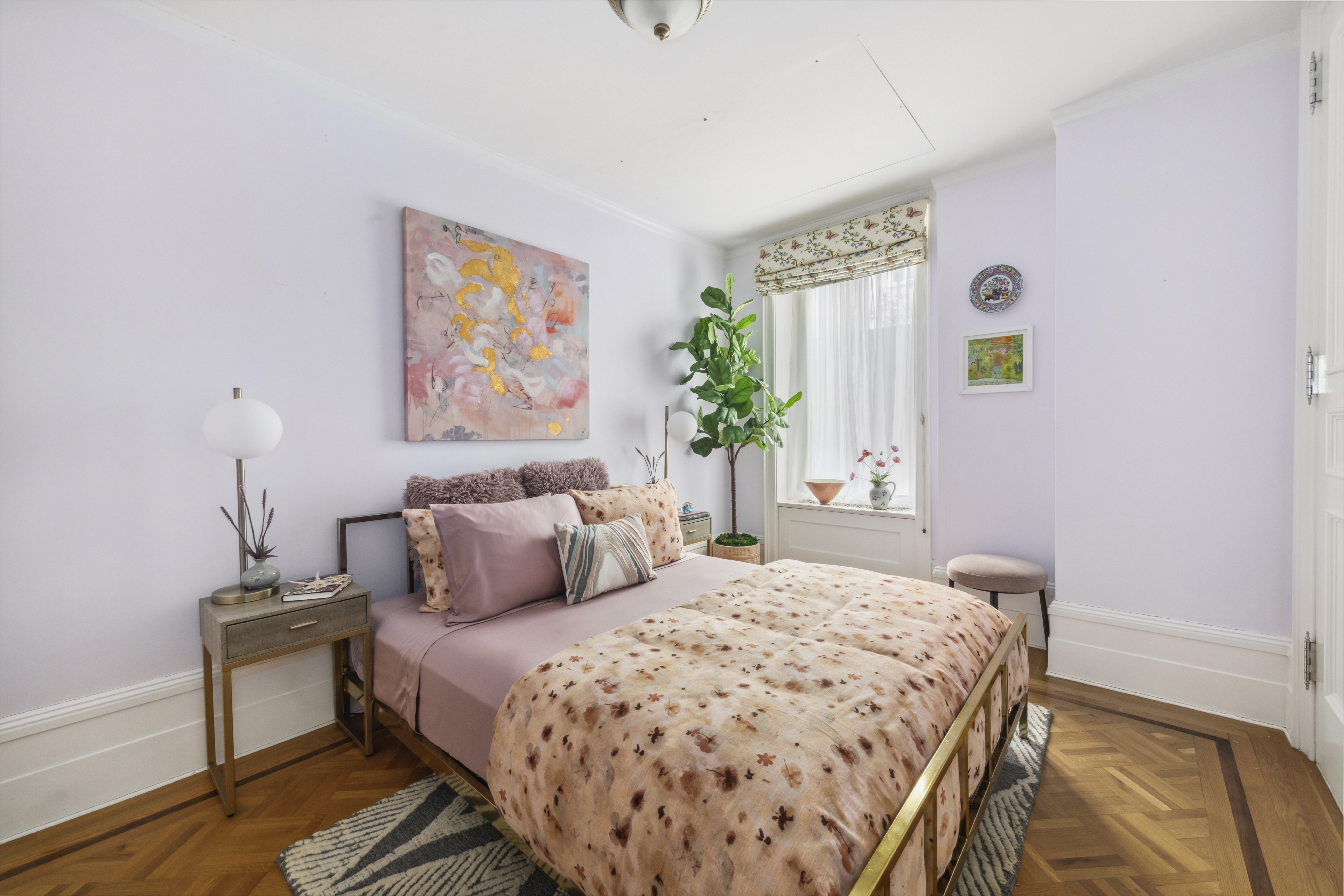 67 Riverside Drive, Unit 1A Manhattan, NY 10024 - Photo 10 of 18 a bedroom with a large bed and a window