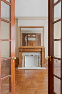 a view of a fireplace and a window