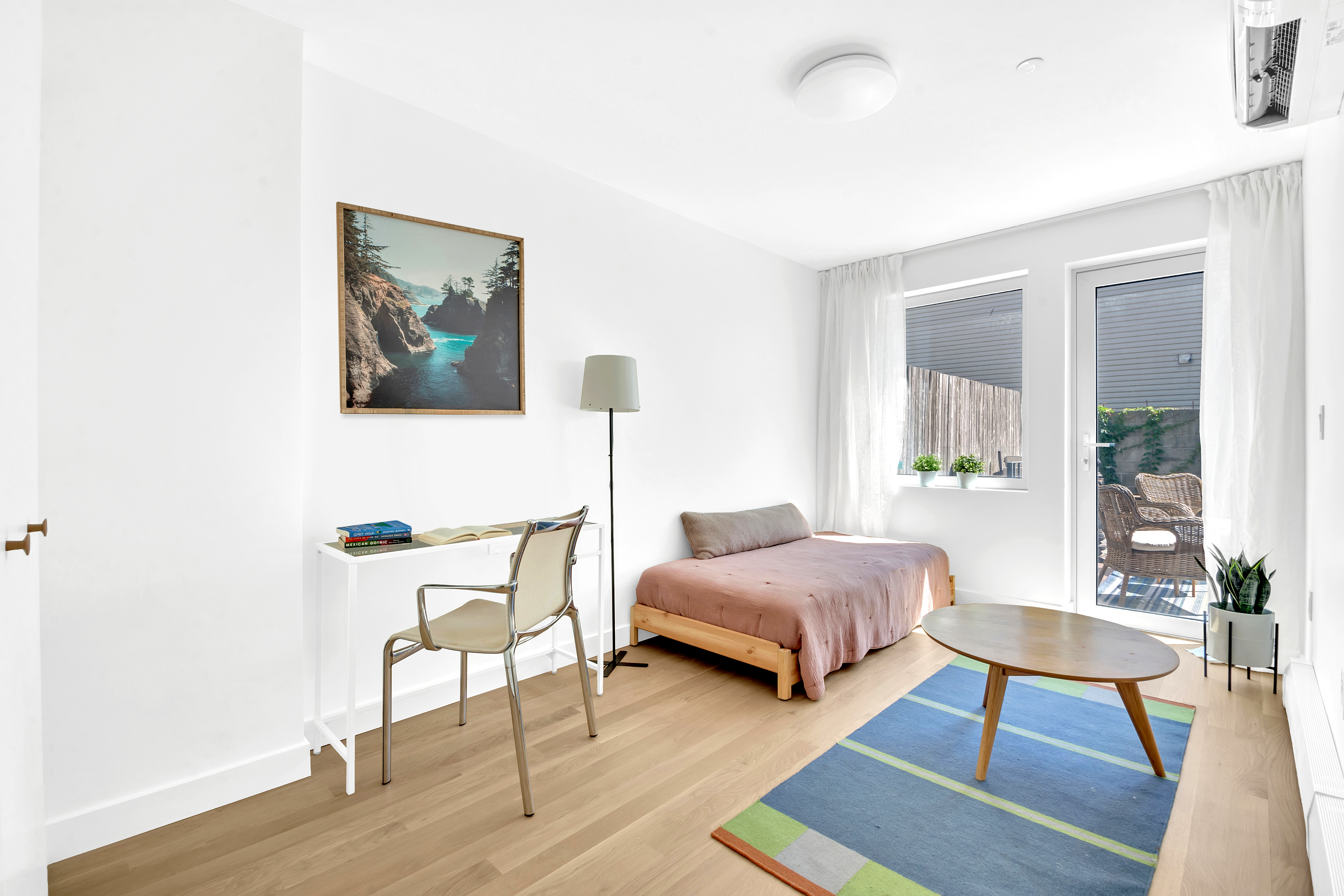 86 Baltic Street, Unit 1 Brooklyn, NY 11201 - Photo 6 of 14 a living room with furniture and a potted plant