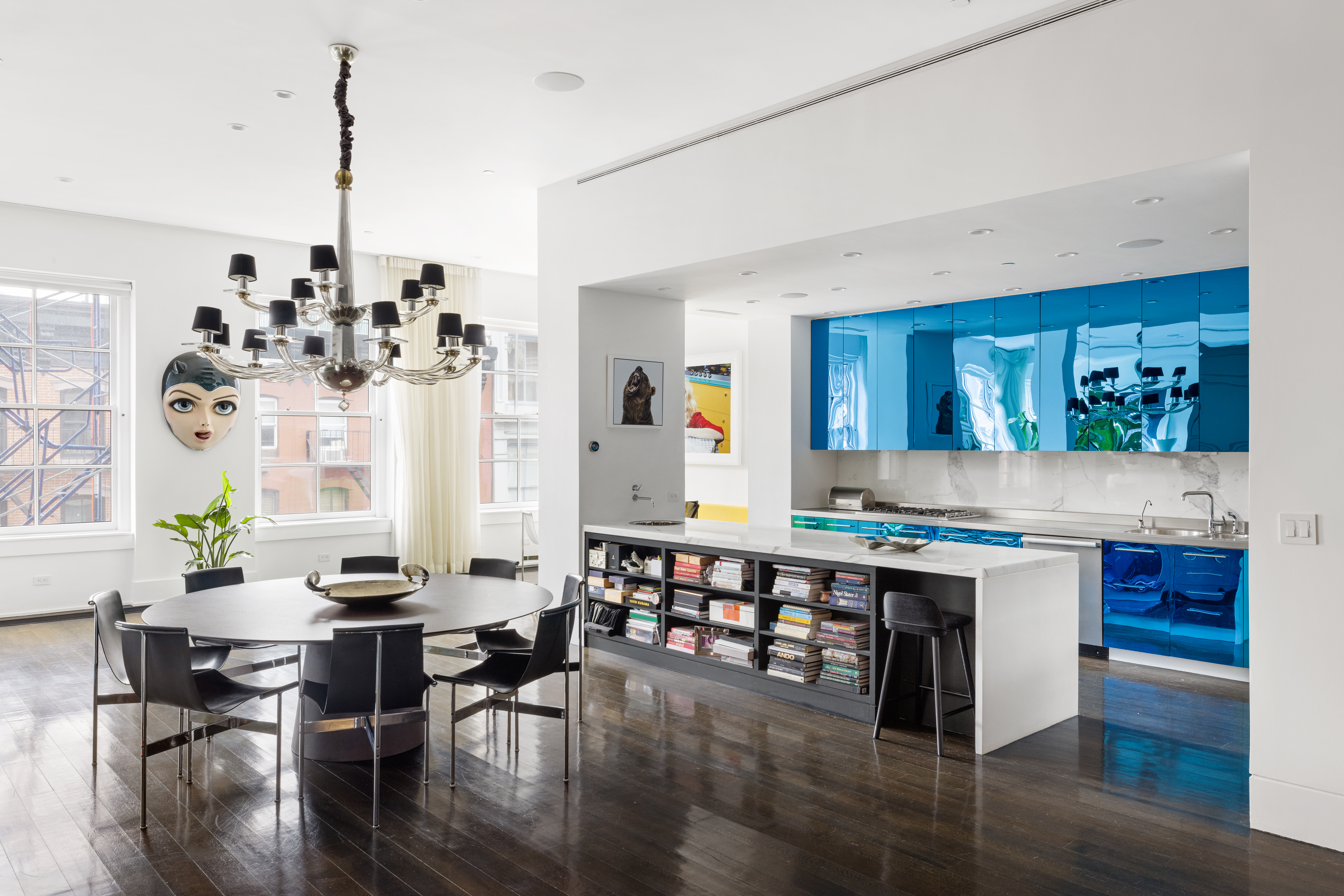 30 Crosby Street, Unit 5B Manhattan, NY 10013 - Photo 7 of 19 a living room with stainless steel appliances kitchen island granite countertop furniture and a wooden floor