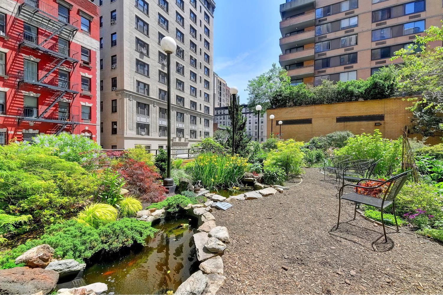 275 West 96th Street, Unit 12B Manhattan, NY 10025 - Photo 26 of 28 a view of a chair and table in the garden