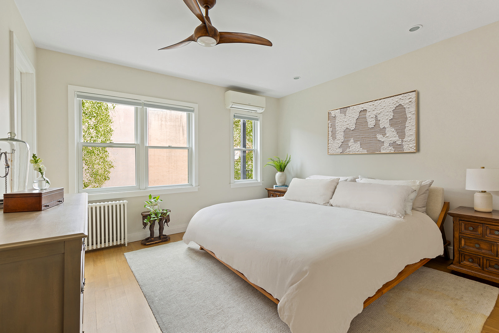 682 A 6th Avenue Brooklyn, NY 11215 - Photo 5 of 16 a bedroom with a large bed and a window