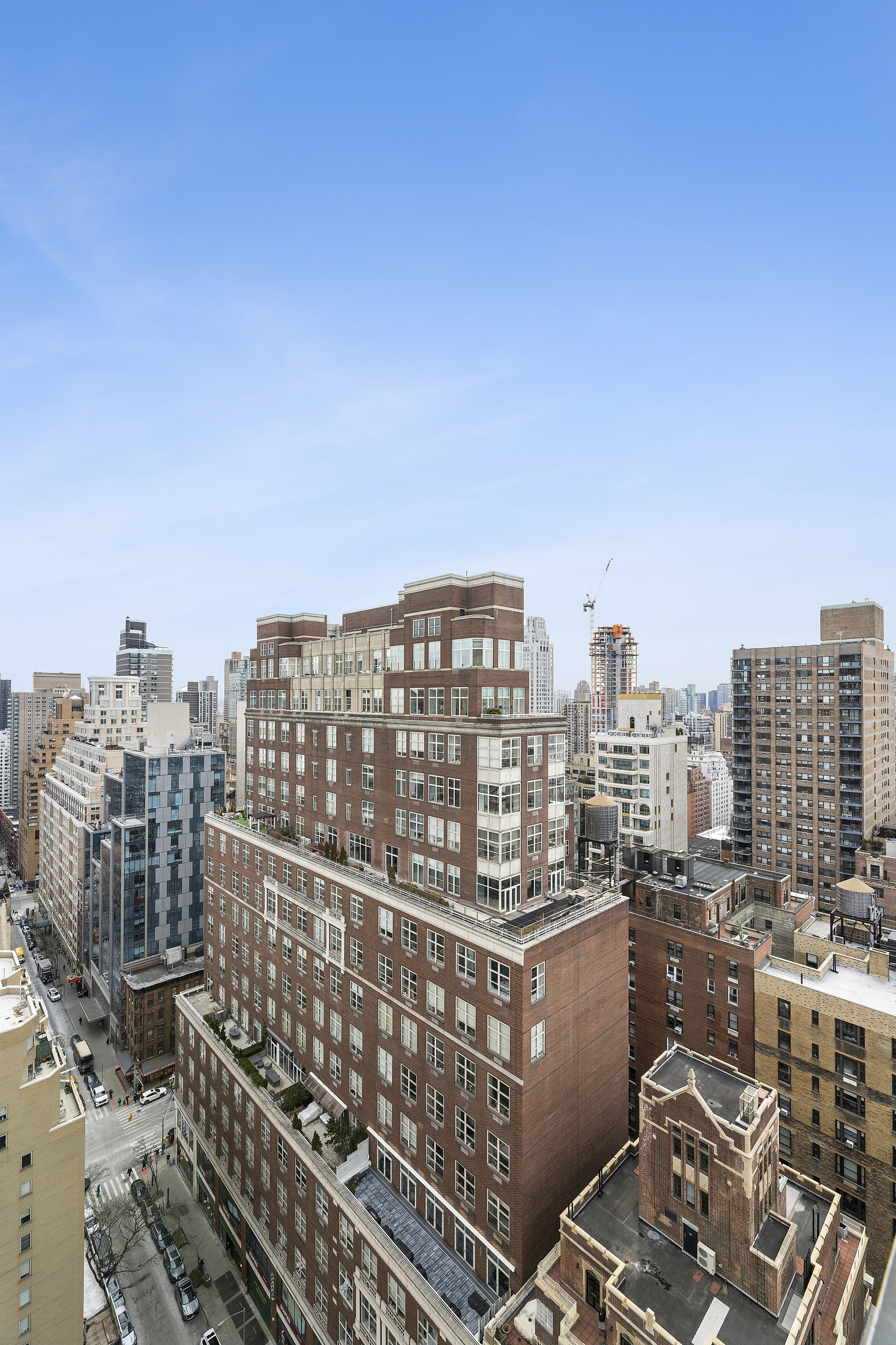 1065 Park Avenue, Unit 27C Manhattan, NY 10128 - Photo 4 of 10 a view of a city with buildings