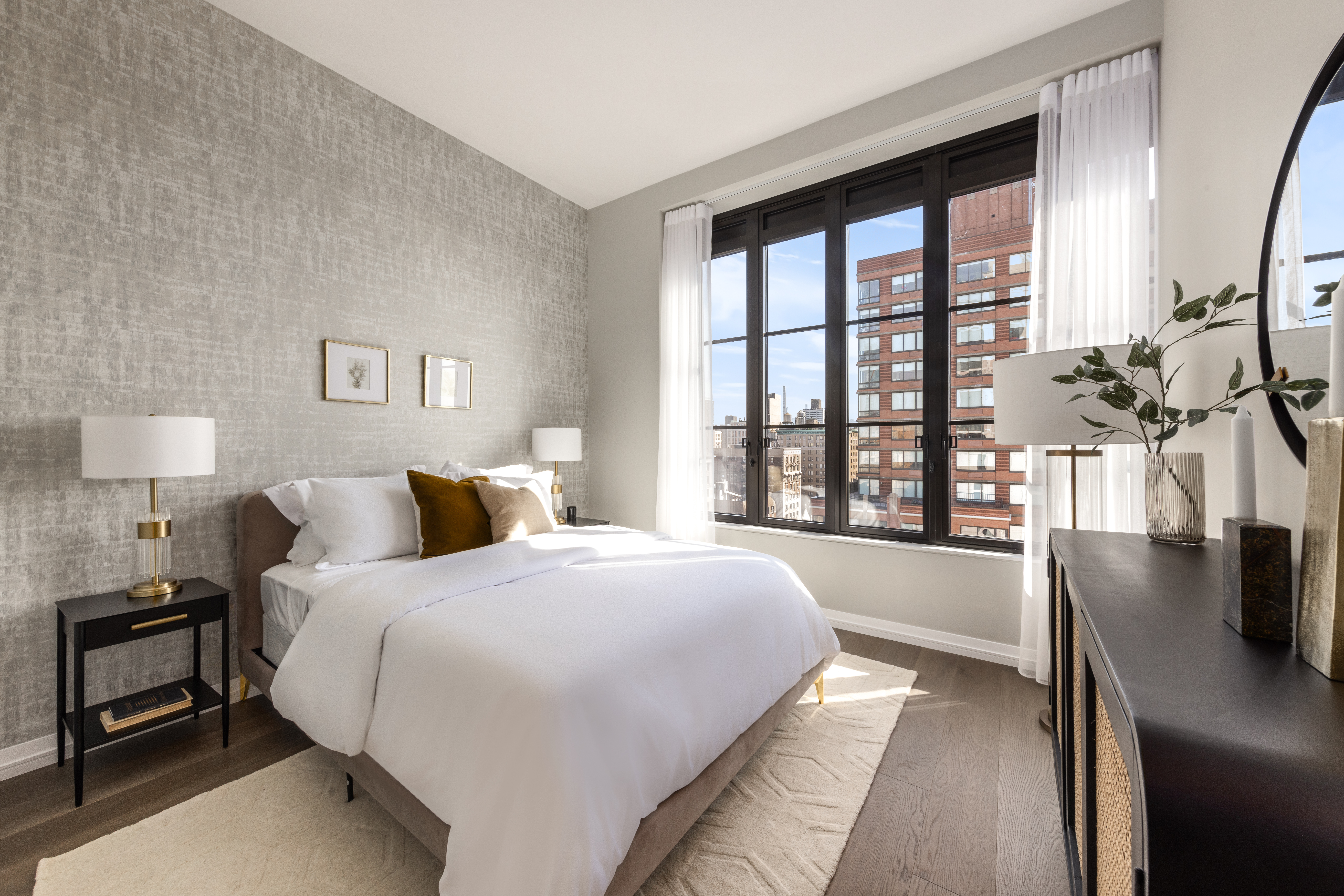 250 West 96th Street, Unit 17D Manhattan, NY 10025 - Photo 11 of 30 a spacious bedroom with a bed and a large window