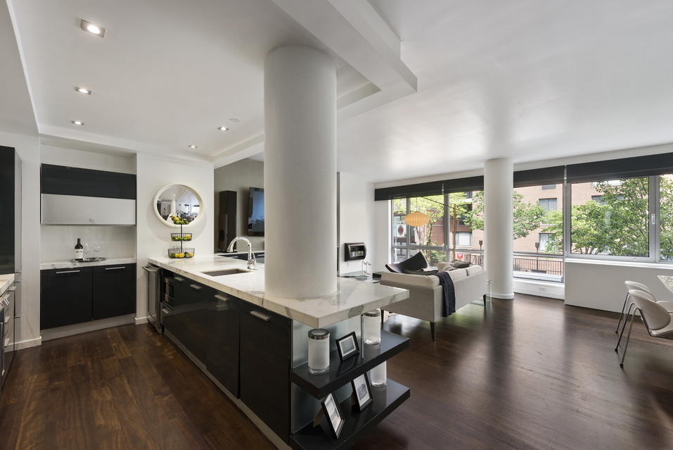 444 West 19th Street, Unit 201 Manhattan, NY 10011 - Photo 3 of 13 a large white room with a large window