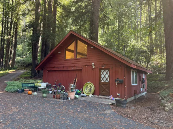 a front view of a house with garage