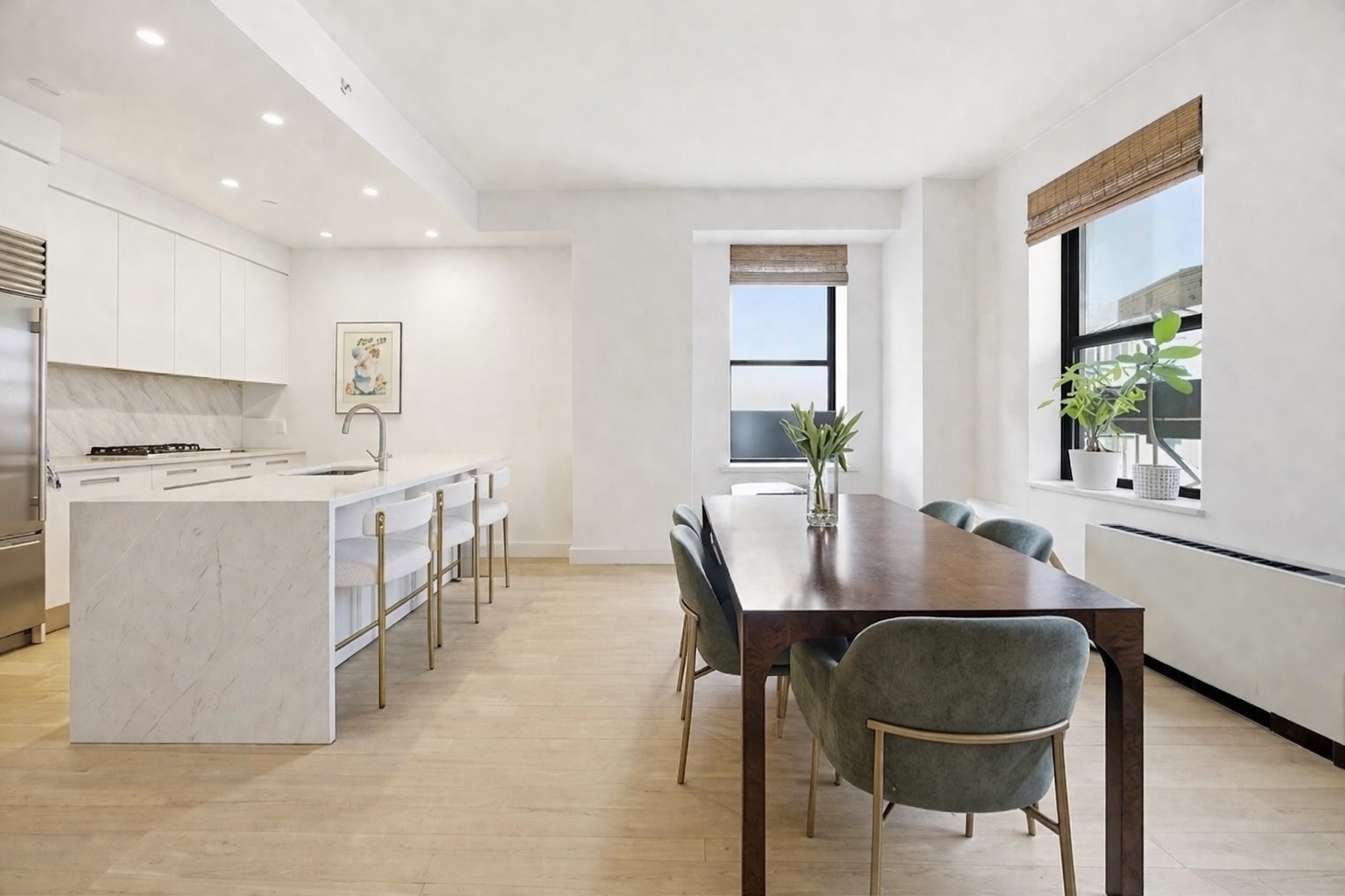 71 Nassau Street, Unit 13C Manhattan, NY 10038 - Photo 7 of 16 a view of a dining room with furniture and a window