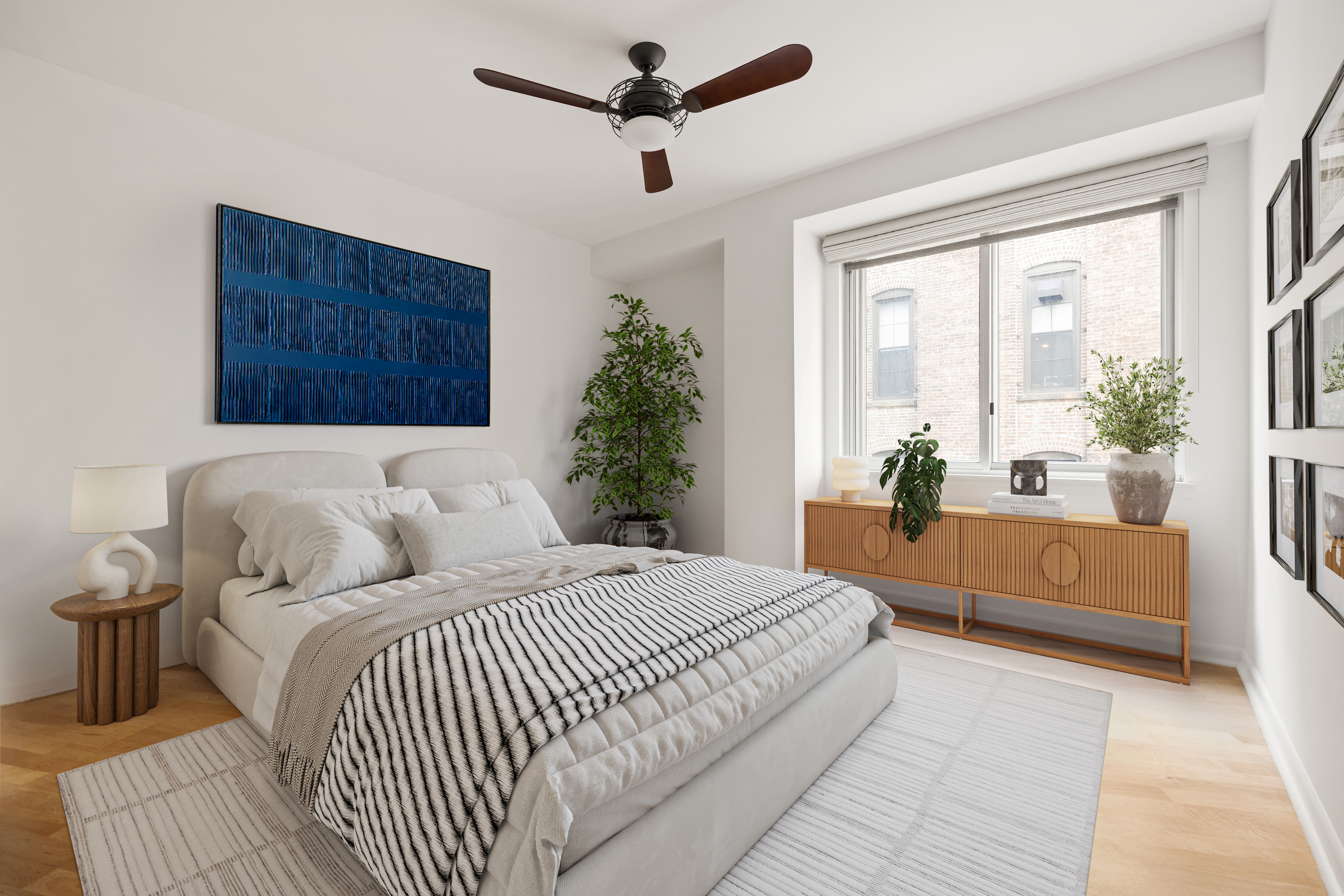 133 Water Street, Unit 5A Brooklyn, NY 11201 - Photo 6 of 13 a bedroom with a large bed and a chandelier