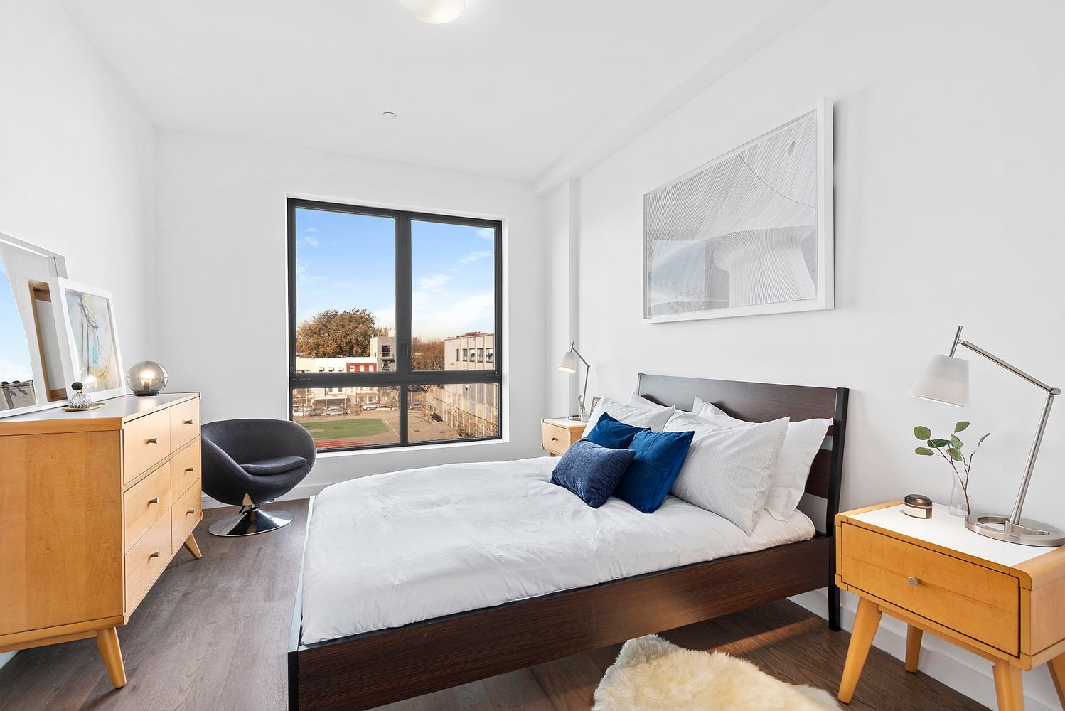 116 Covert Street, Unit 4A Brooklyn, NY 11207 - Photo 3 of 7 a bedroom with a bed and a window