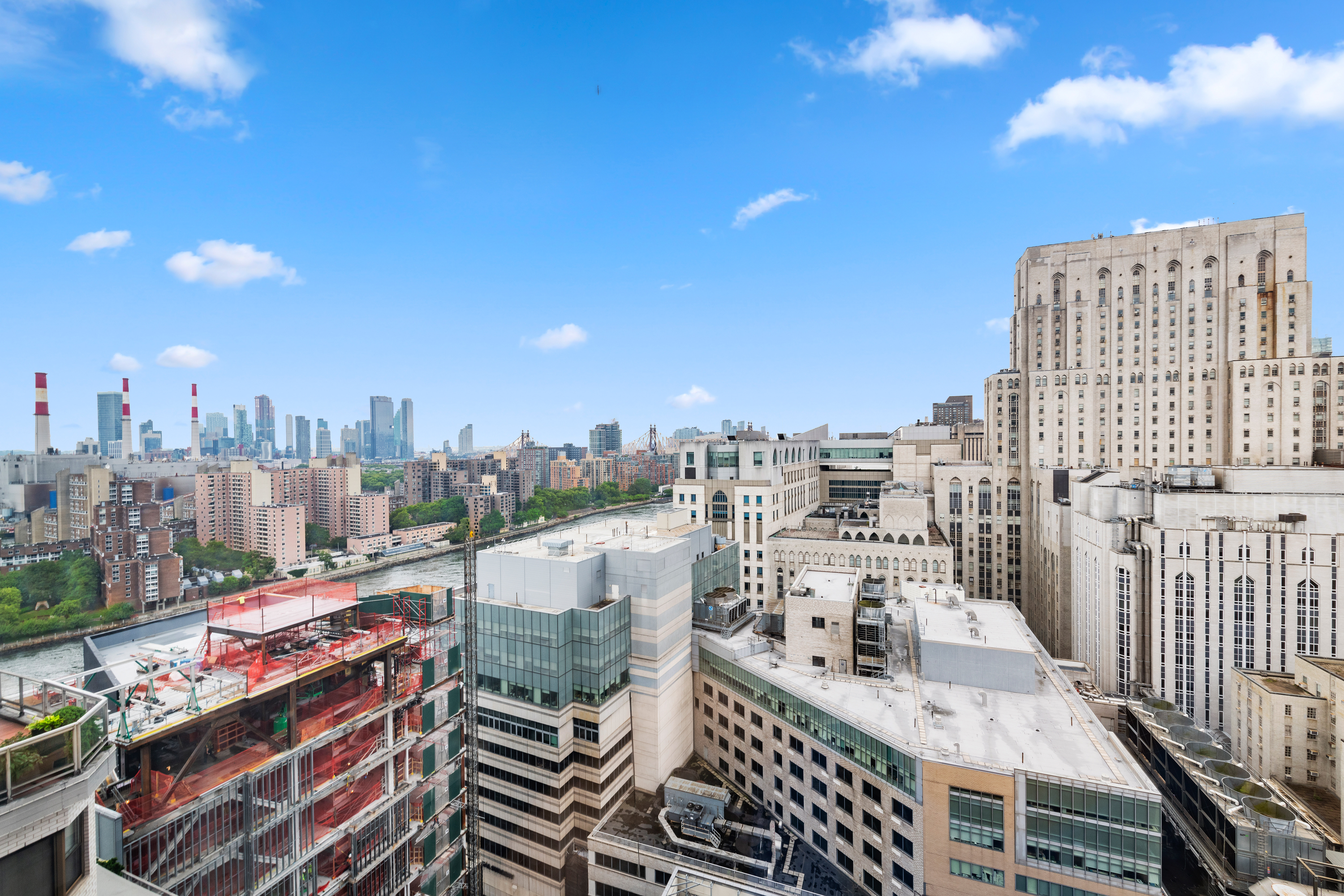 524 East 72nd Street, Unit 26A Manhattan, NY 10021 - Photo 9 of 16 a city view with tall buildings