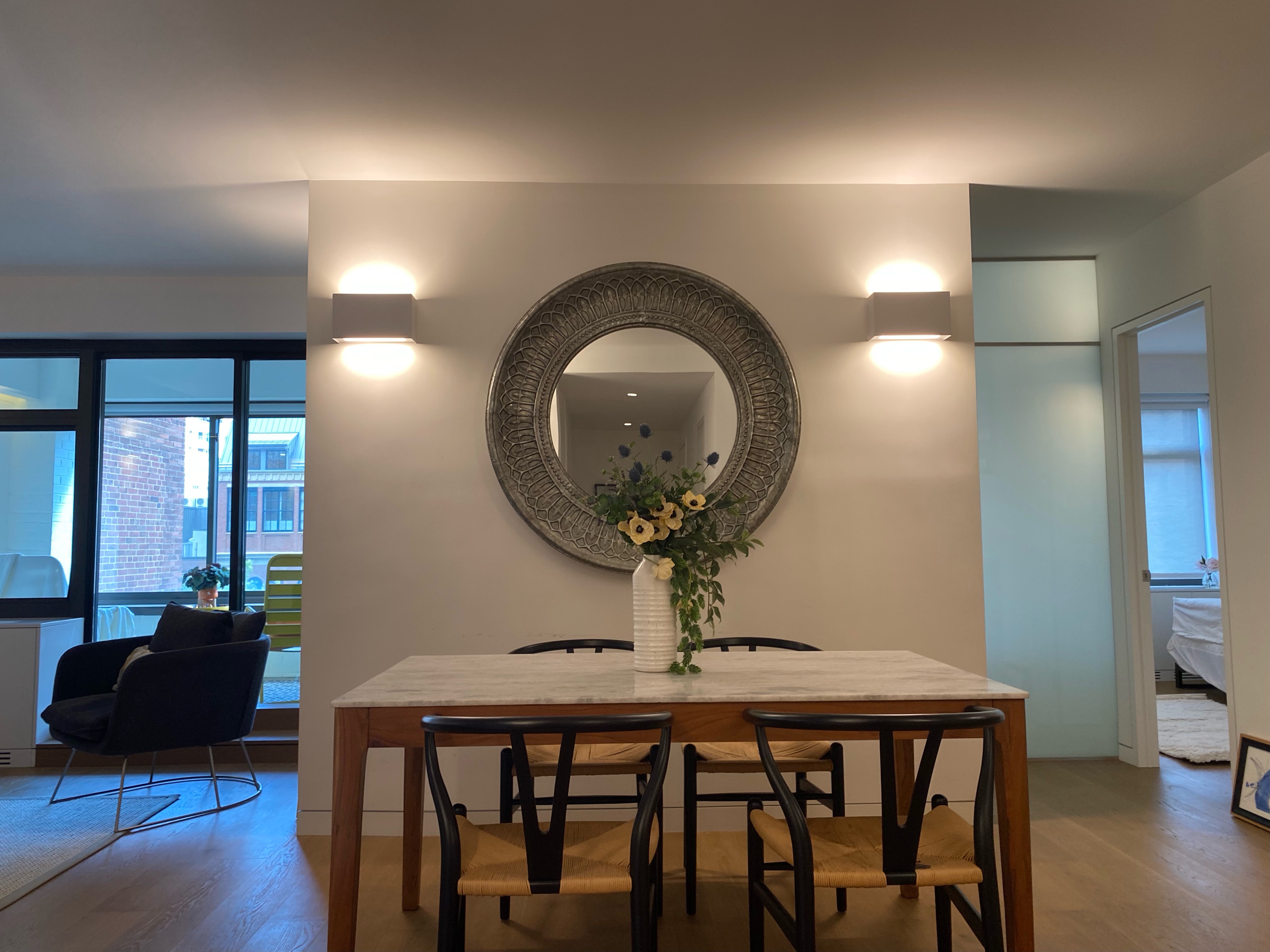 124 East 79th Street, Unit 7D Manhattan, NY 10075 - Photo 4 of 25 a view of a livingroom with furniture and wooden floor