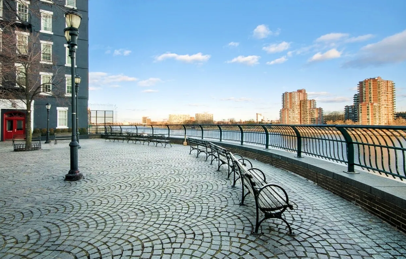 530 East 72nd Street, Unit 4F Manhattan, NY 10021 - Photo 12 of 23 a view of a terrace with wooden benches