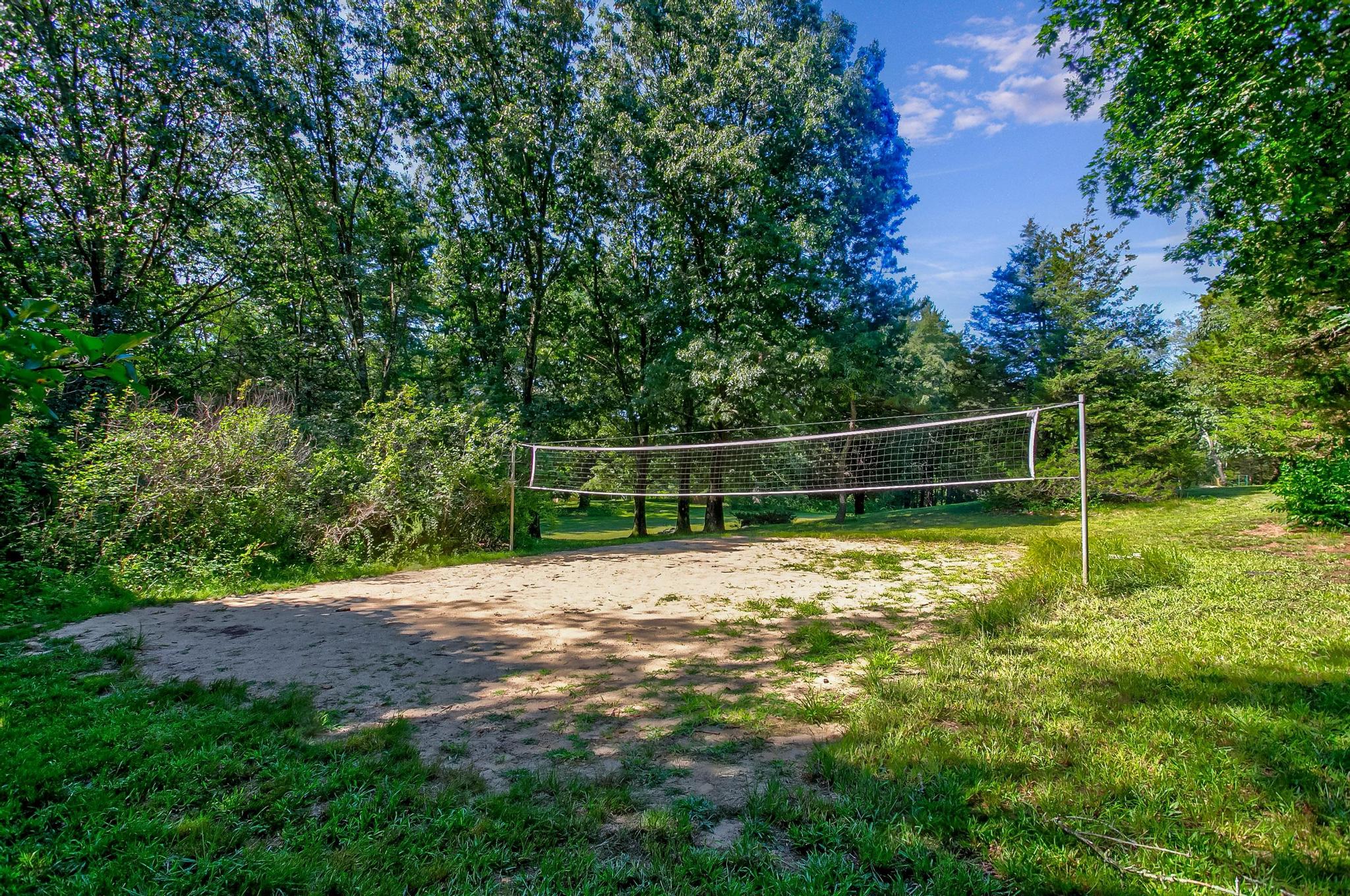 14 Barberry Road Lexington, MA 02421 - Photo 27 of 30 a backyard of a house with lots of green space