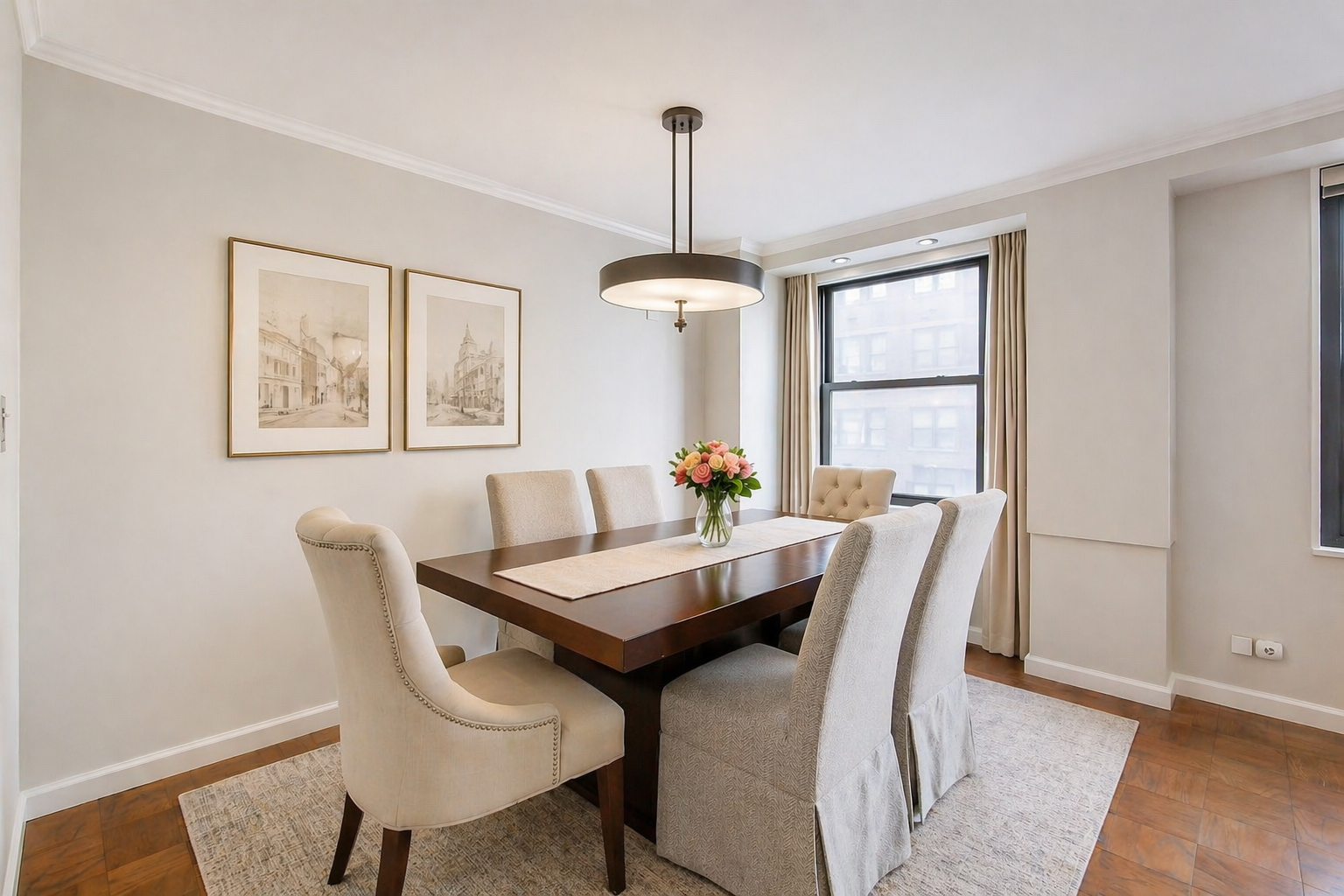 225 East 57th Street, Unit 5K Manhattan, NY 10022 - Photo 3 of 11 a view of a dining room with furniture window and wooden floor