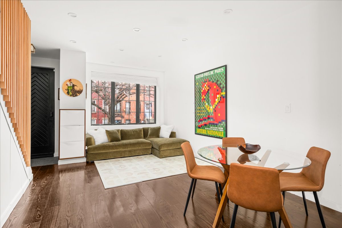 211 14th Street Brooklyn, NY 11215 - Photo 5 of 18 a living room with furniture and a window