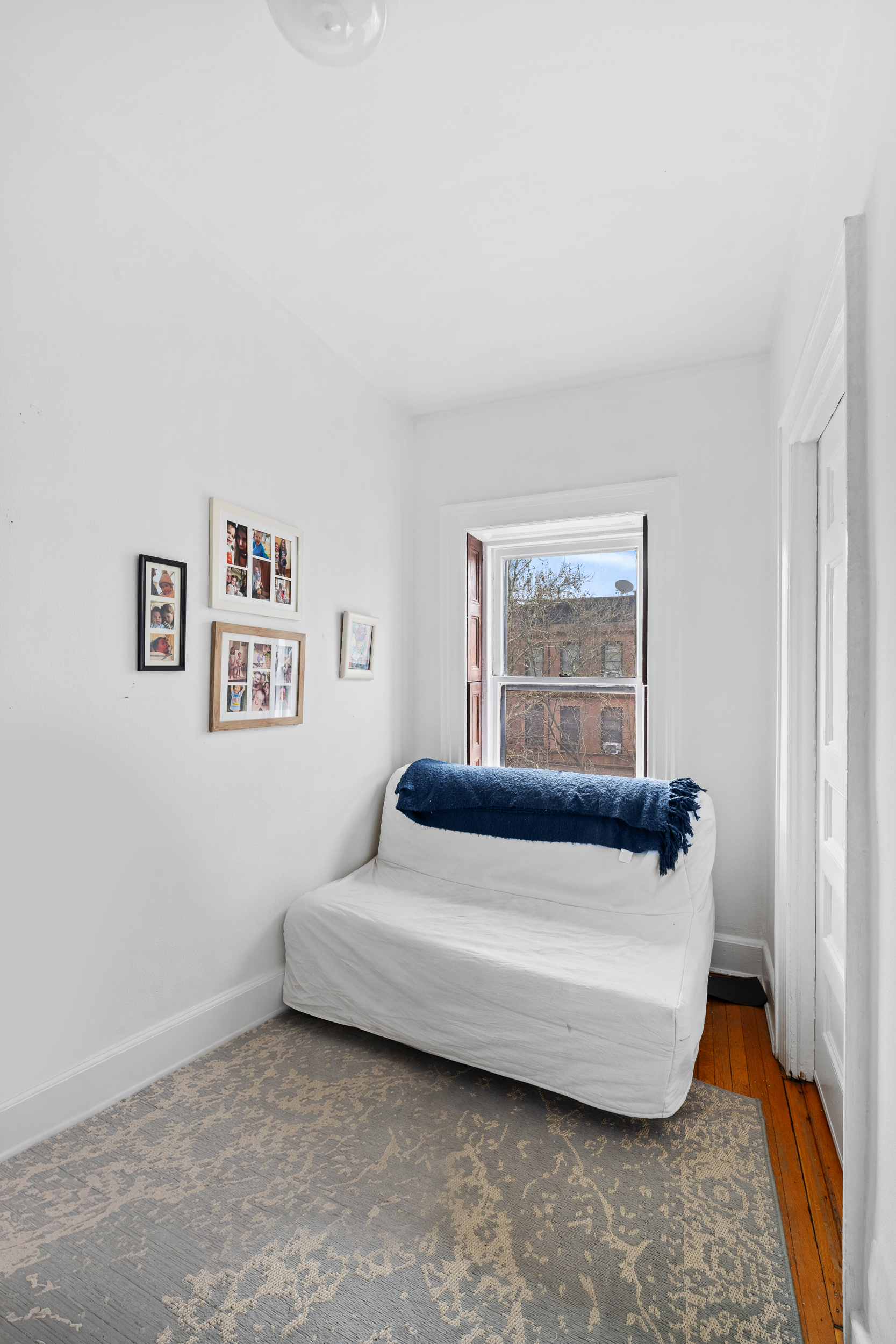 227 Garfield Place, Unit 2 Brooklyn, NY 11215 - Photo 13 of 15 a bedroom with bed and a window