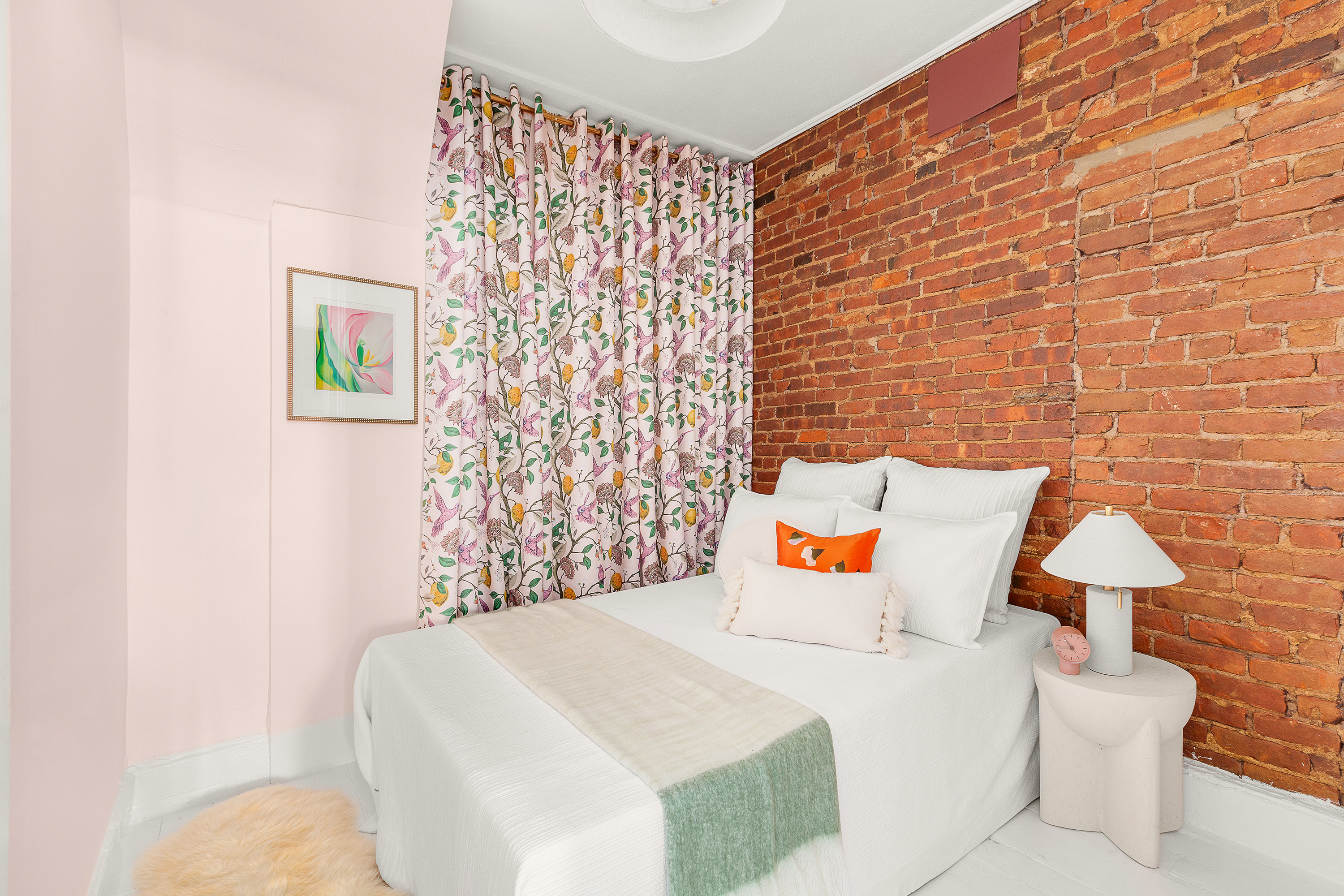 24 Cornelia Street, Unit 15 Manhattan, NY 10014 - Photo 5 of 13 a bedroom with a bed and a lamp