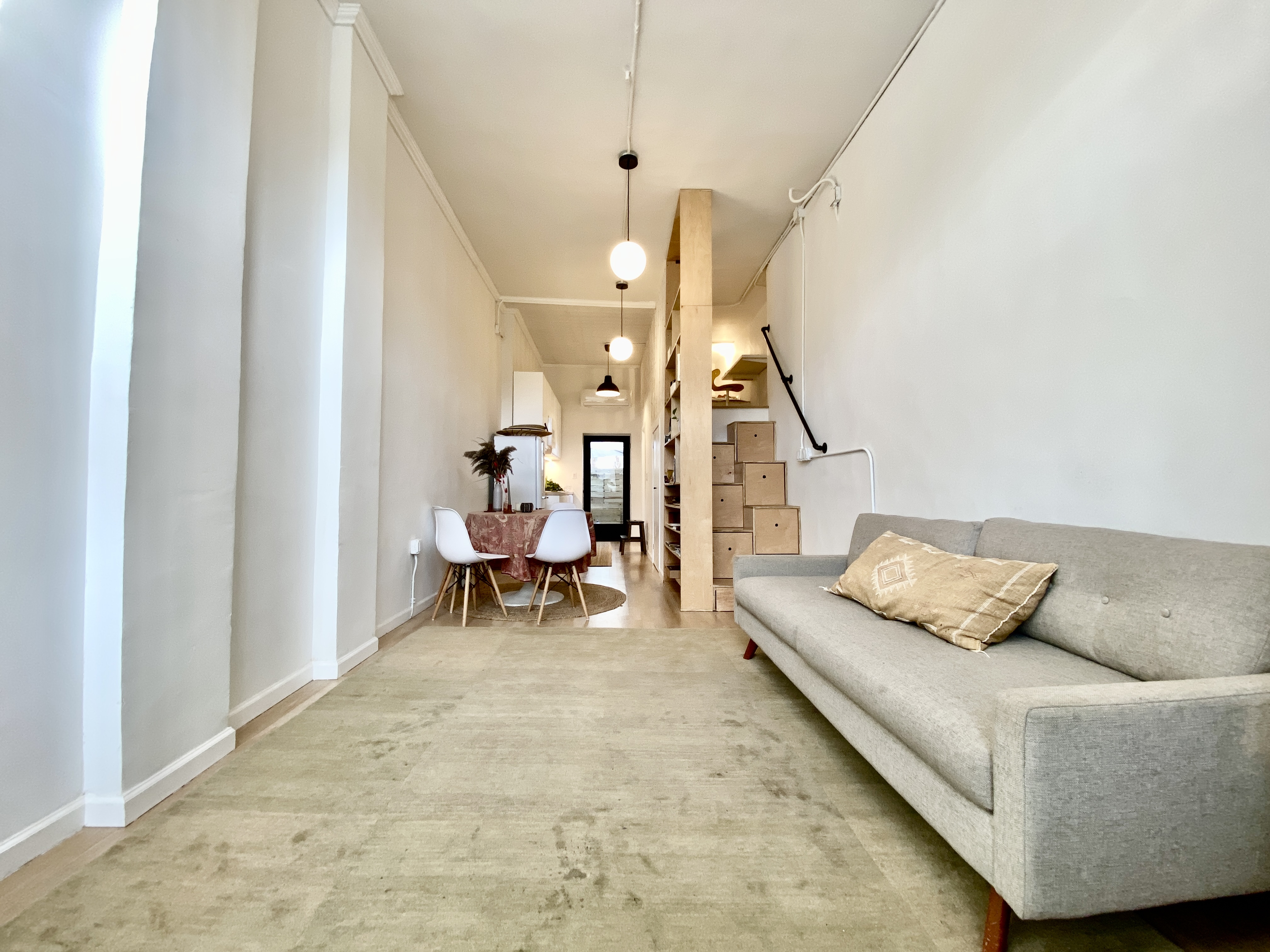409 Smith Street, Unit 1 Brooklyn, NY 11231 - Photo 5 of 9 a living room with furniture and wooden floor