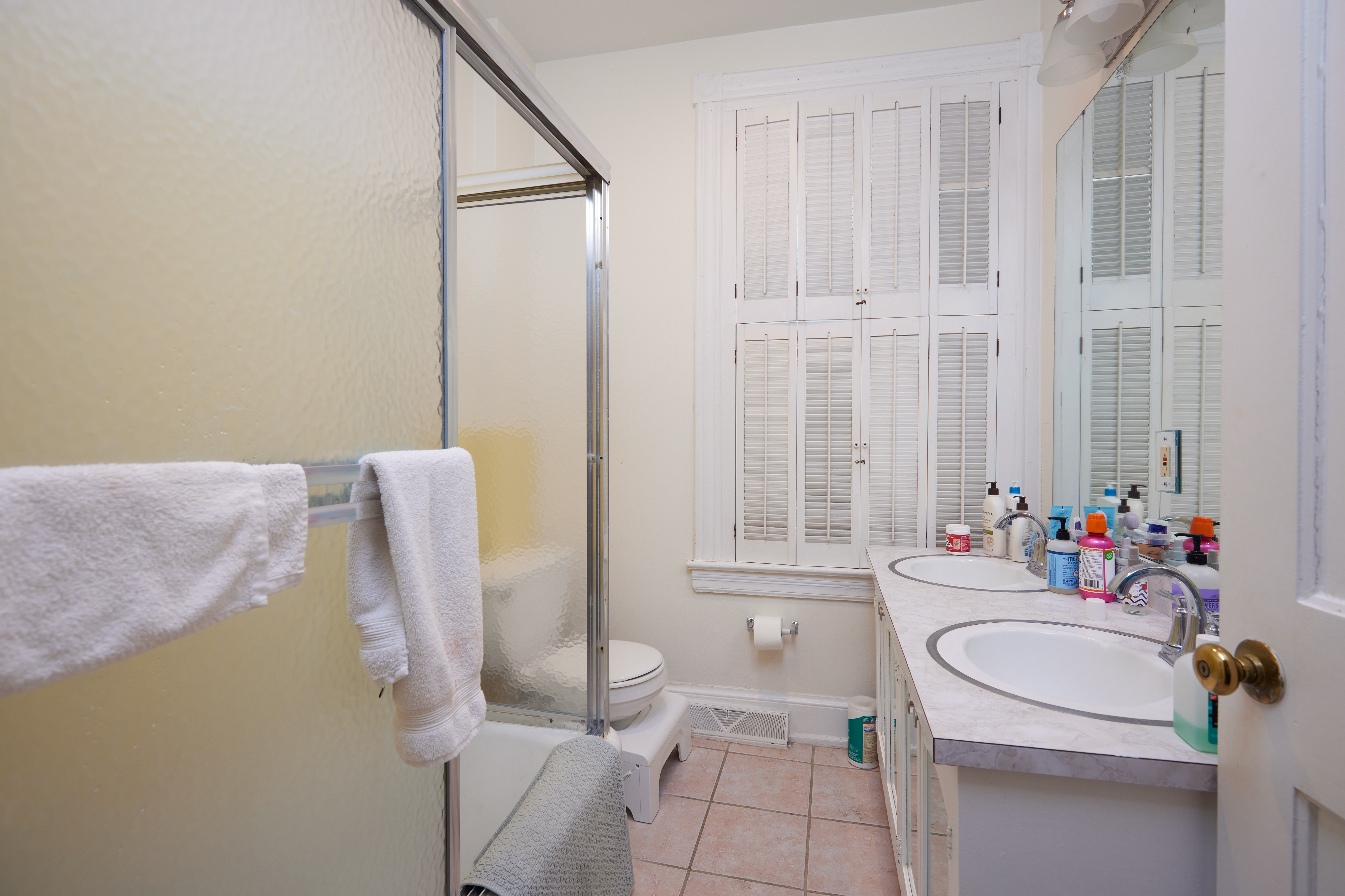 3420 R Street Northwest Washington, DC 20007 - Photo 20 of 53 a bathroom with a sink vanity mirror and toilet