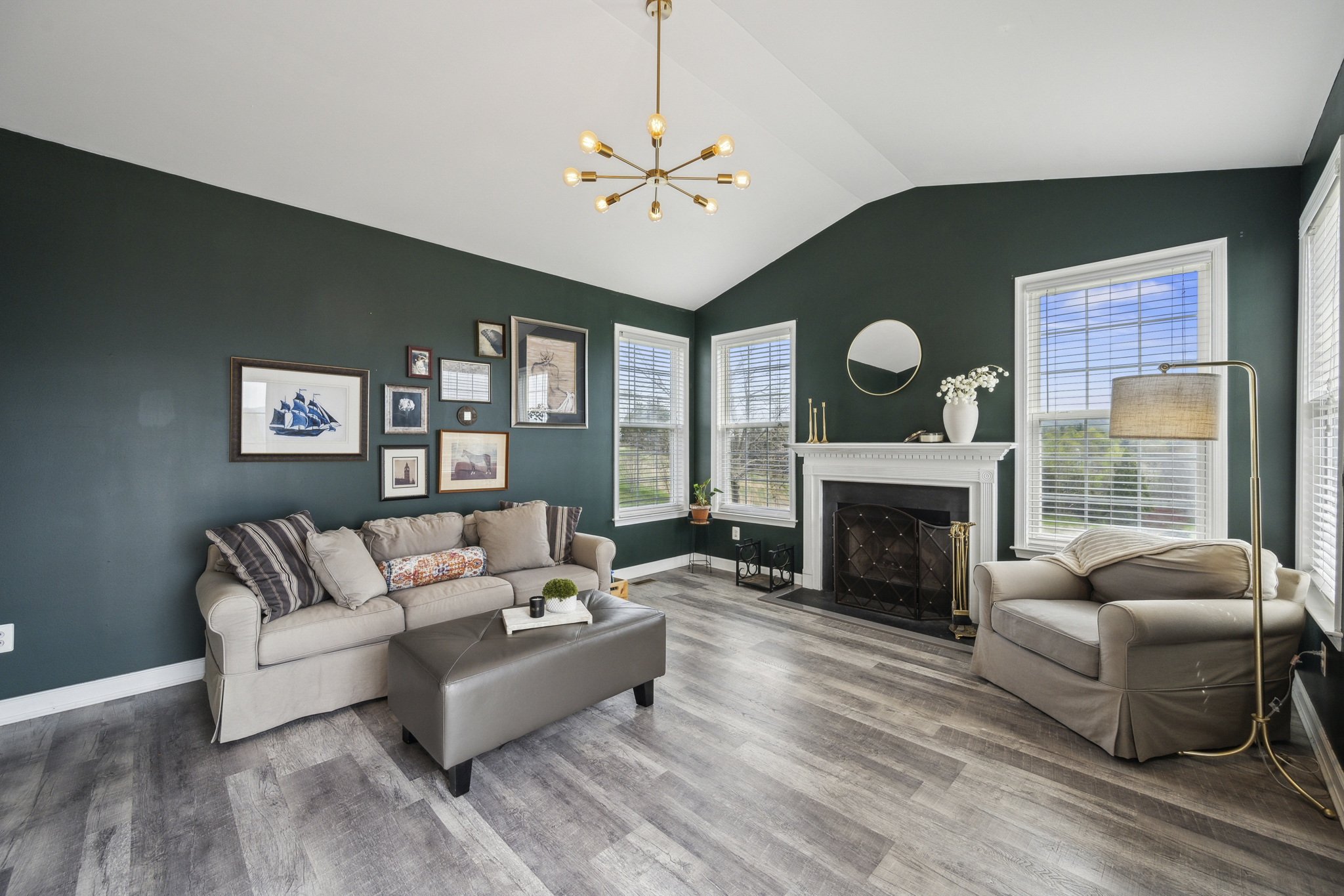 127 Hartman Road Pottstown, PA 19465 - Photo 14 of 42 a living room with furniture and a fireplace