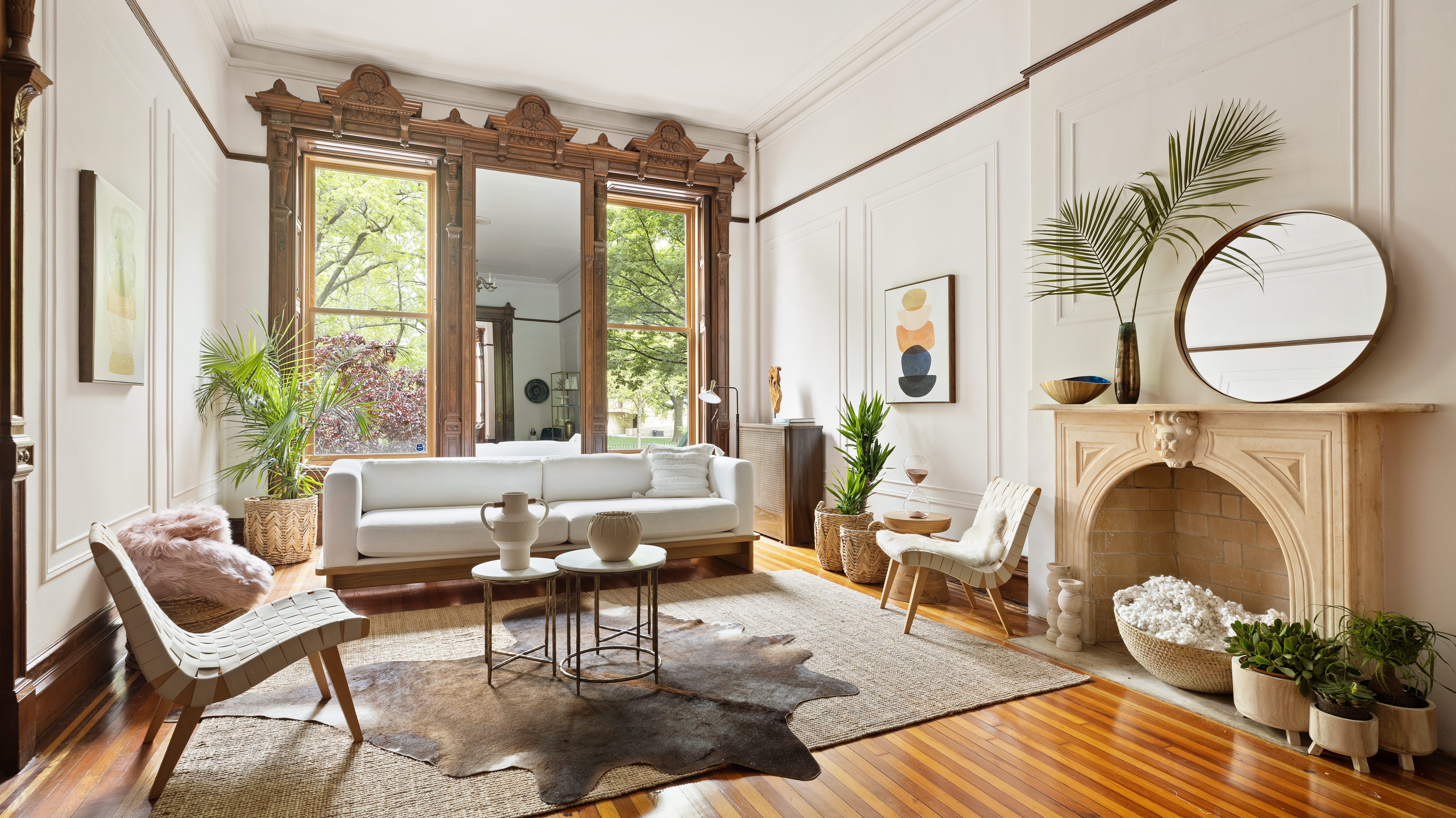 34 Mt Morris Park West Manhattan, NY 10027 - Photo 2 of 15 a living room with furniture a fireplace and a large window