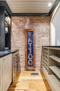 a view of front door of house with window