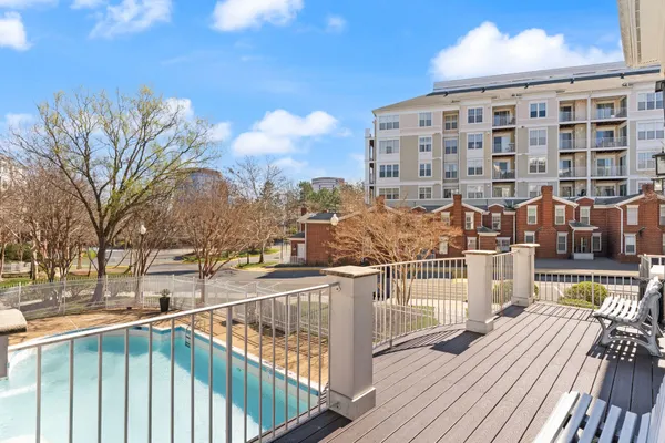 a view of swimming pool with outdoor seating