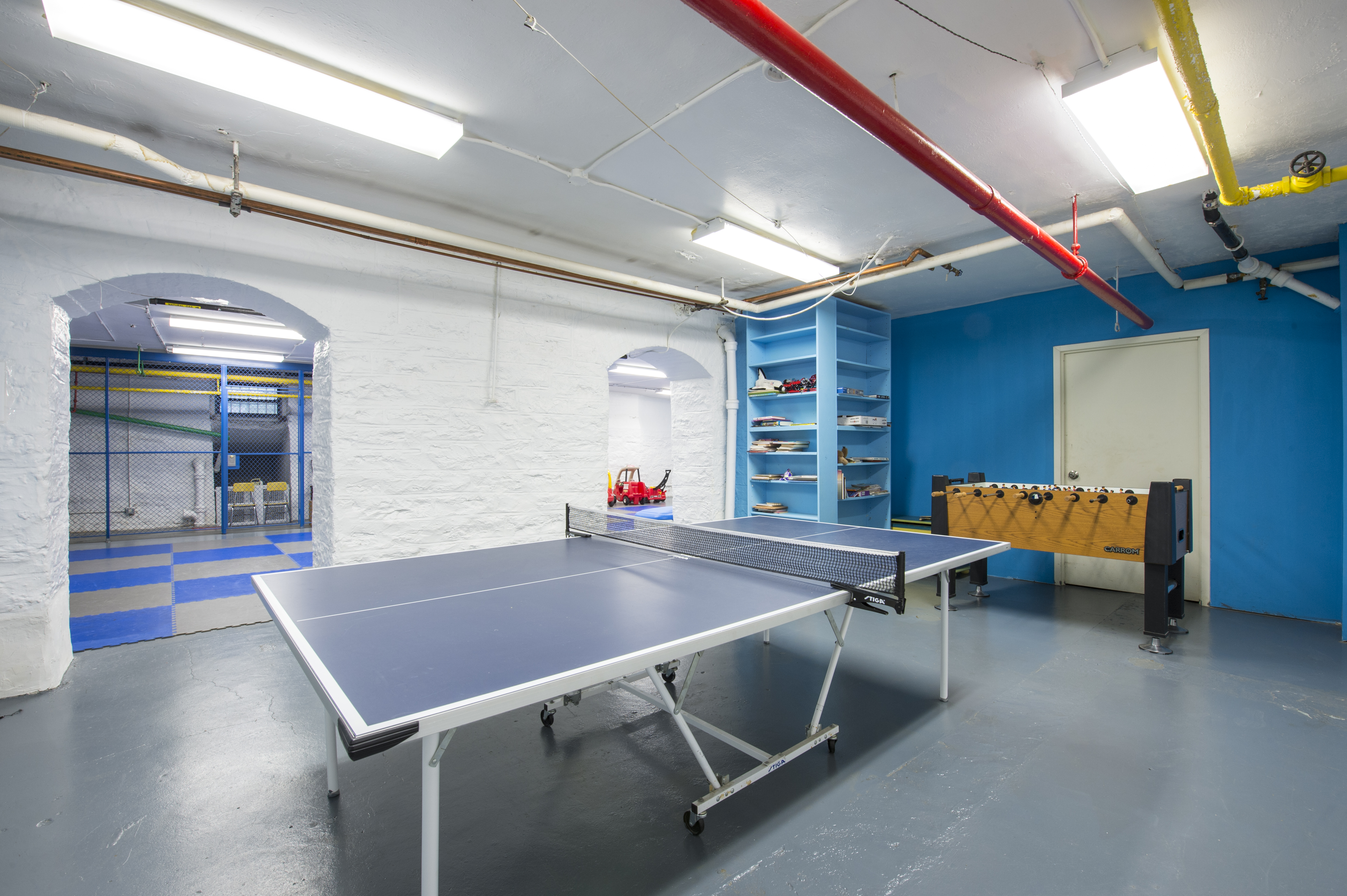 194 Riverside Drive, Unit 5E Manhattan, NY 10025 - Photo 23 of 26 a living room with furniture and pool table