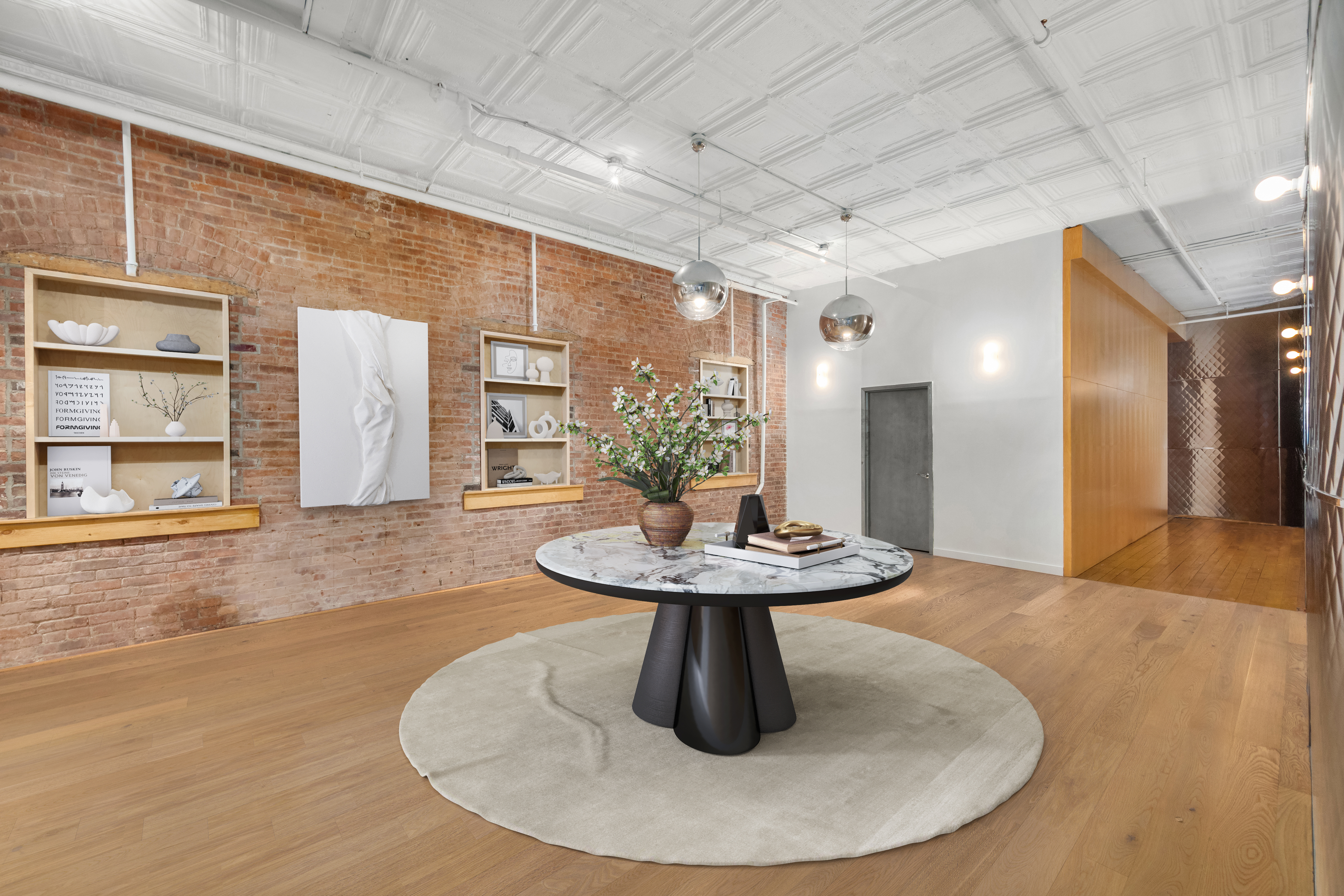 253 West 28th Street, Unit 5 Manhattan, NY 10001 - Photo 5 of 19 a view of a livingroom with furniture and wooden floor