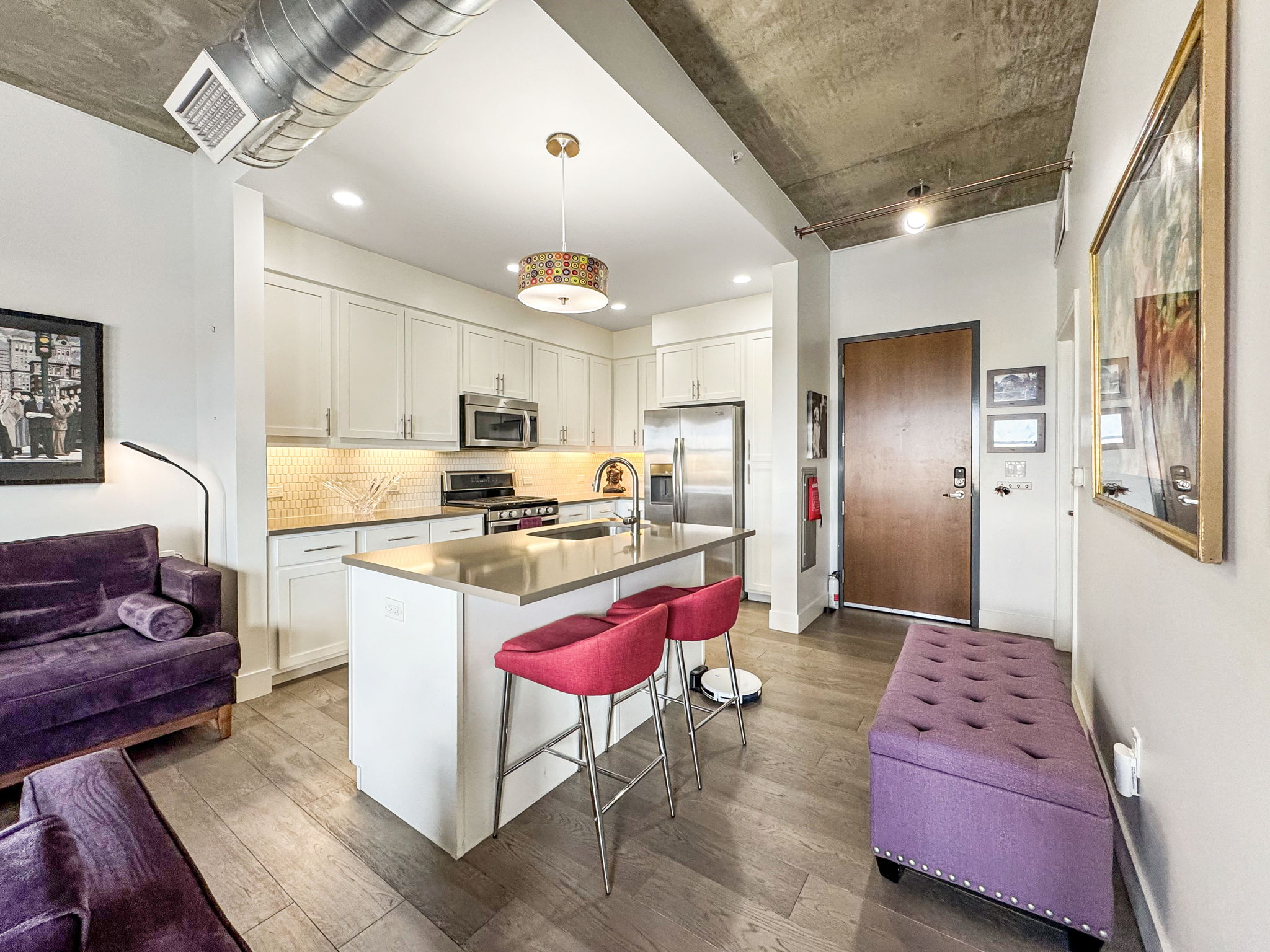 3401 Arapahoe Avenue, Unit Undisclosed Boulder, CO 80303 - Photo 6 of 28 a kitchen with kitchen island granite countertop lots of counter top space