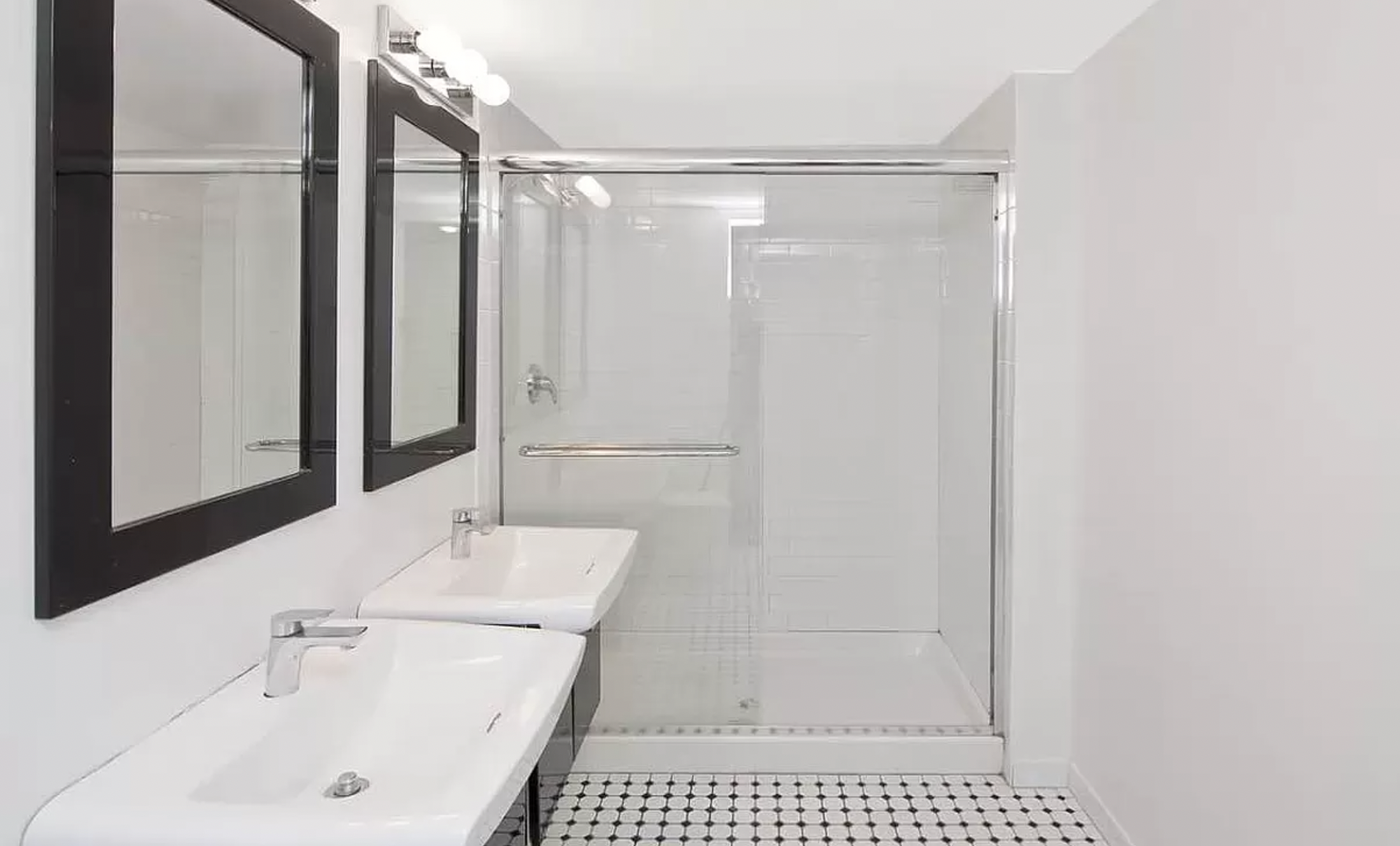 44 Berry Street, Unit 2G Brooklyn, NY 11249 - Photo 5 of 7 a bathroom with a sink and a mirror