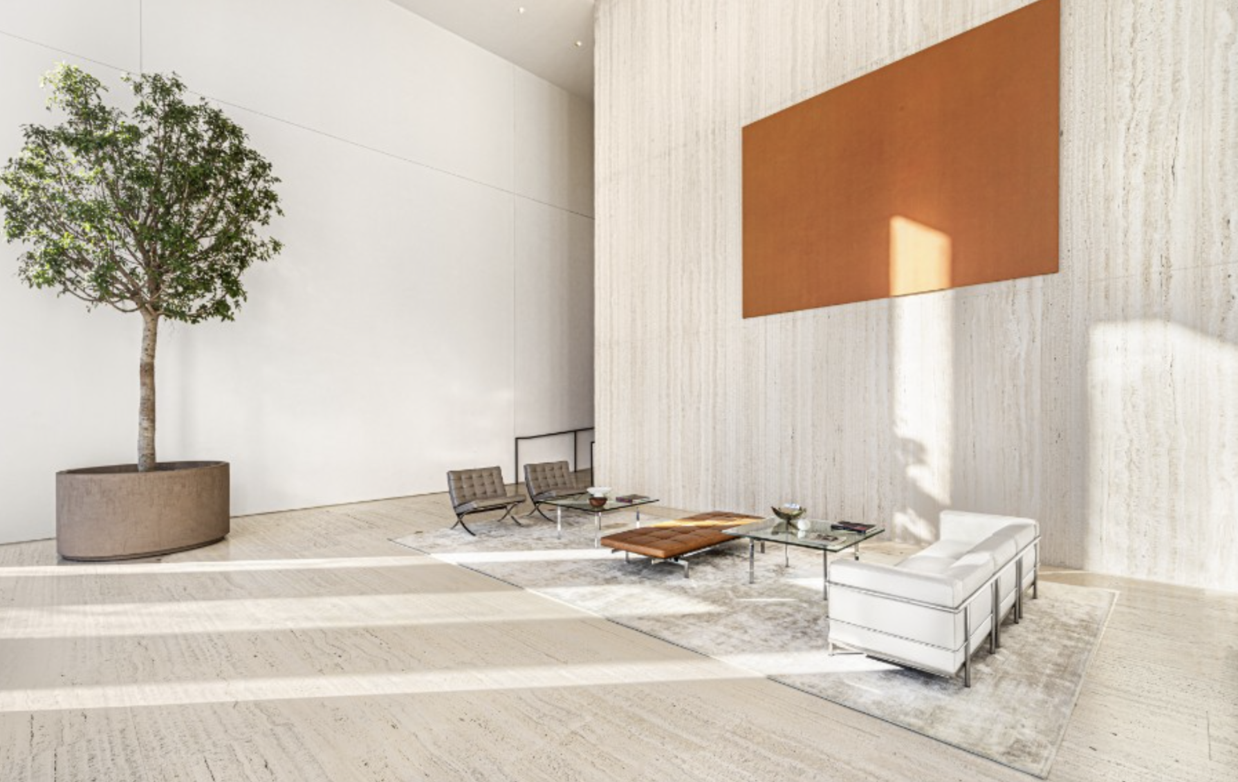 695 1st Avenue, Unit 31C Manhattan, NY 10016 - Photo 14 of 27 a living room with furniture and a potted plant