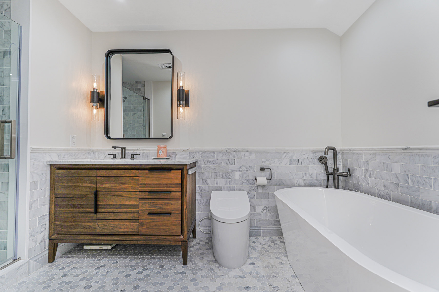 165 Swaim Avenue Staten Island, NY 10312 - Photo 13 of 45 a bathroom with a sink and a mirror
