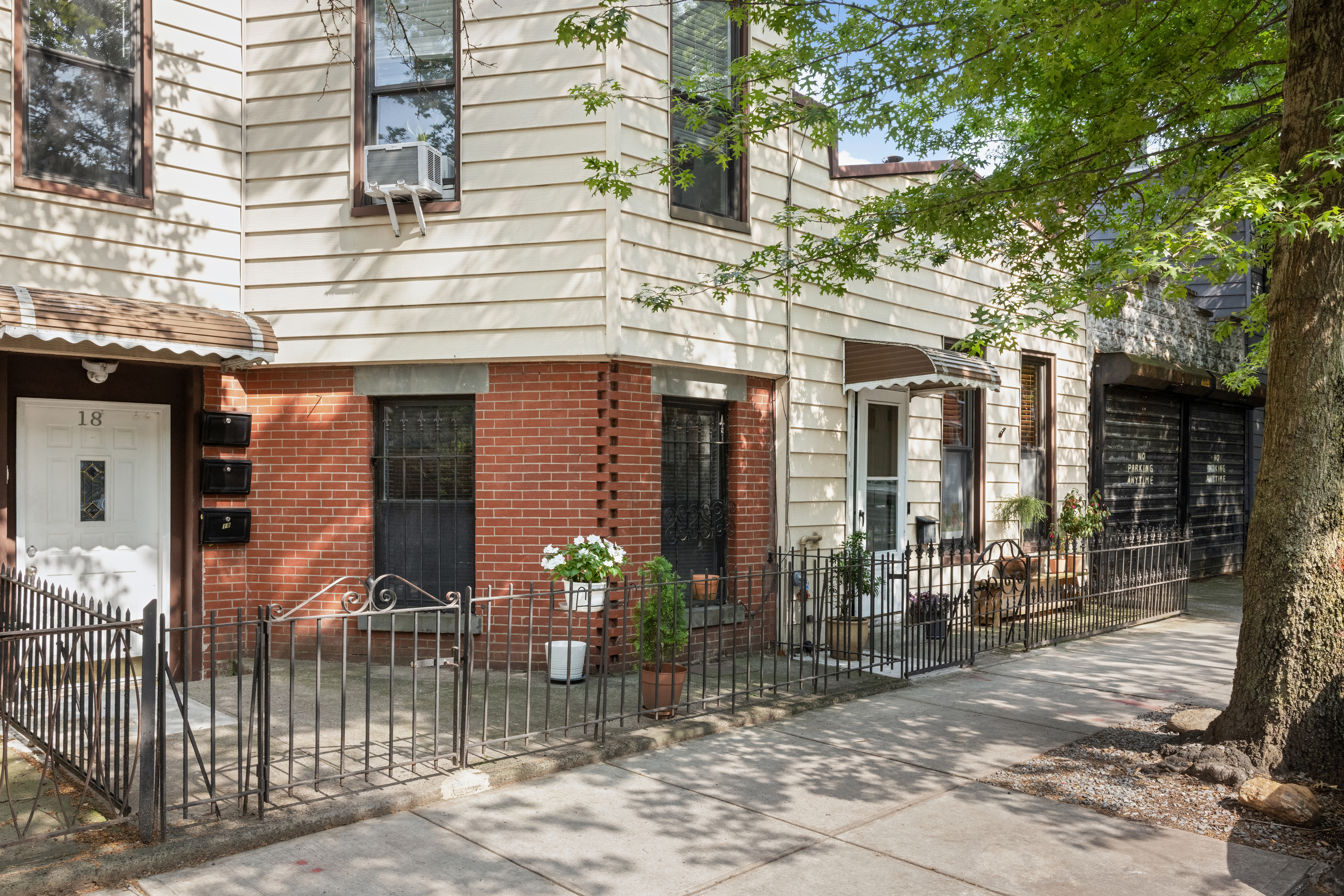 18 Russell Street Brooklyn, NY 11222 - Photo 1 of 24 a front view of a building with outdoor seating