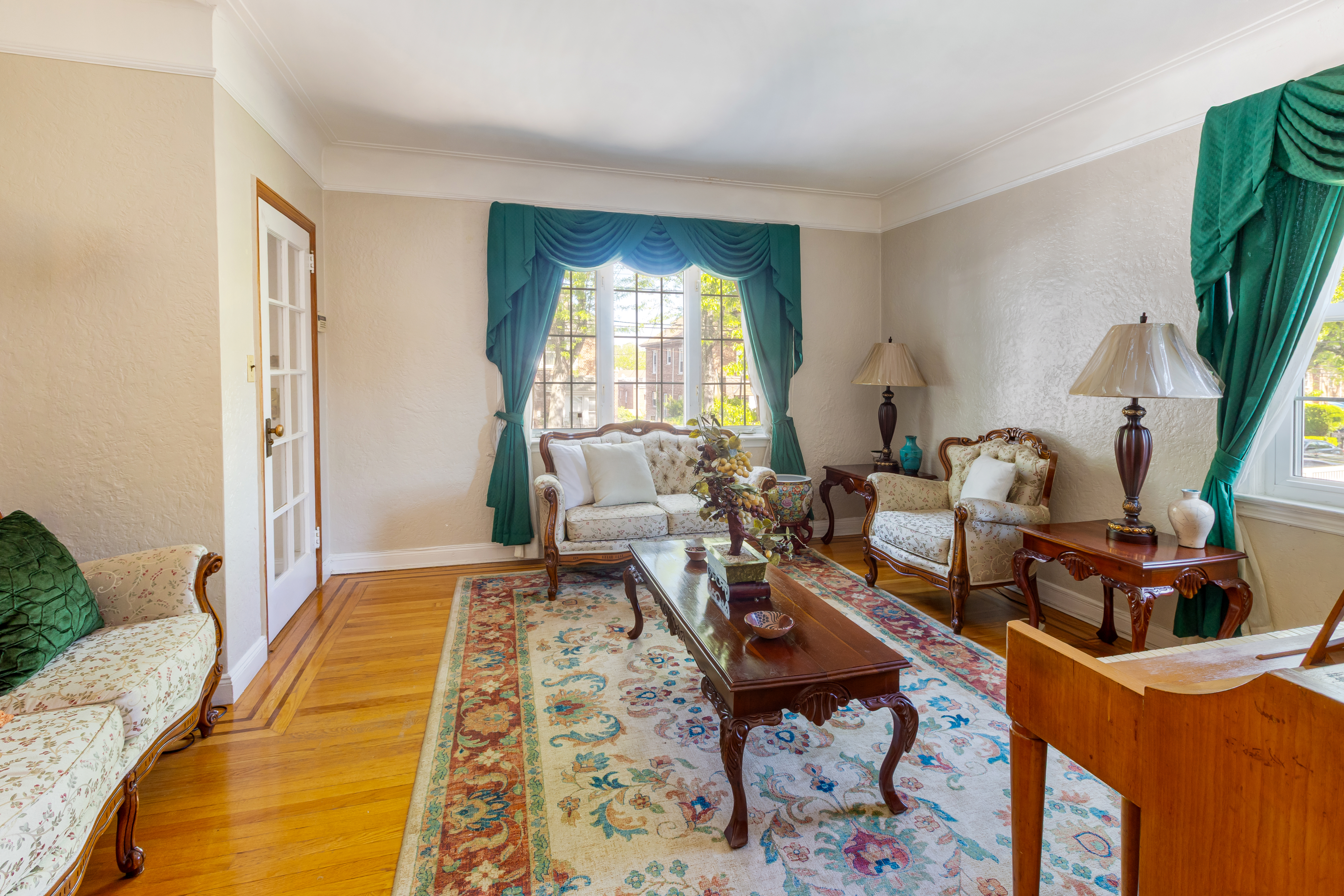 4167 Bruner Avenue Bronx, NY 10466 - Photo 6 of 16 a living room with furniture and a flat screen tv