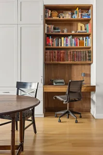 a view of a workspace with furniture