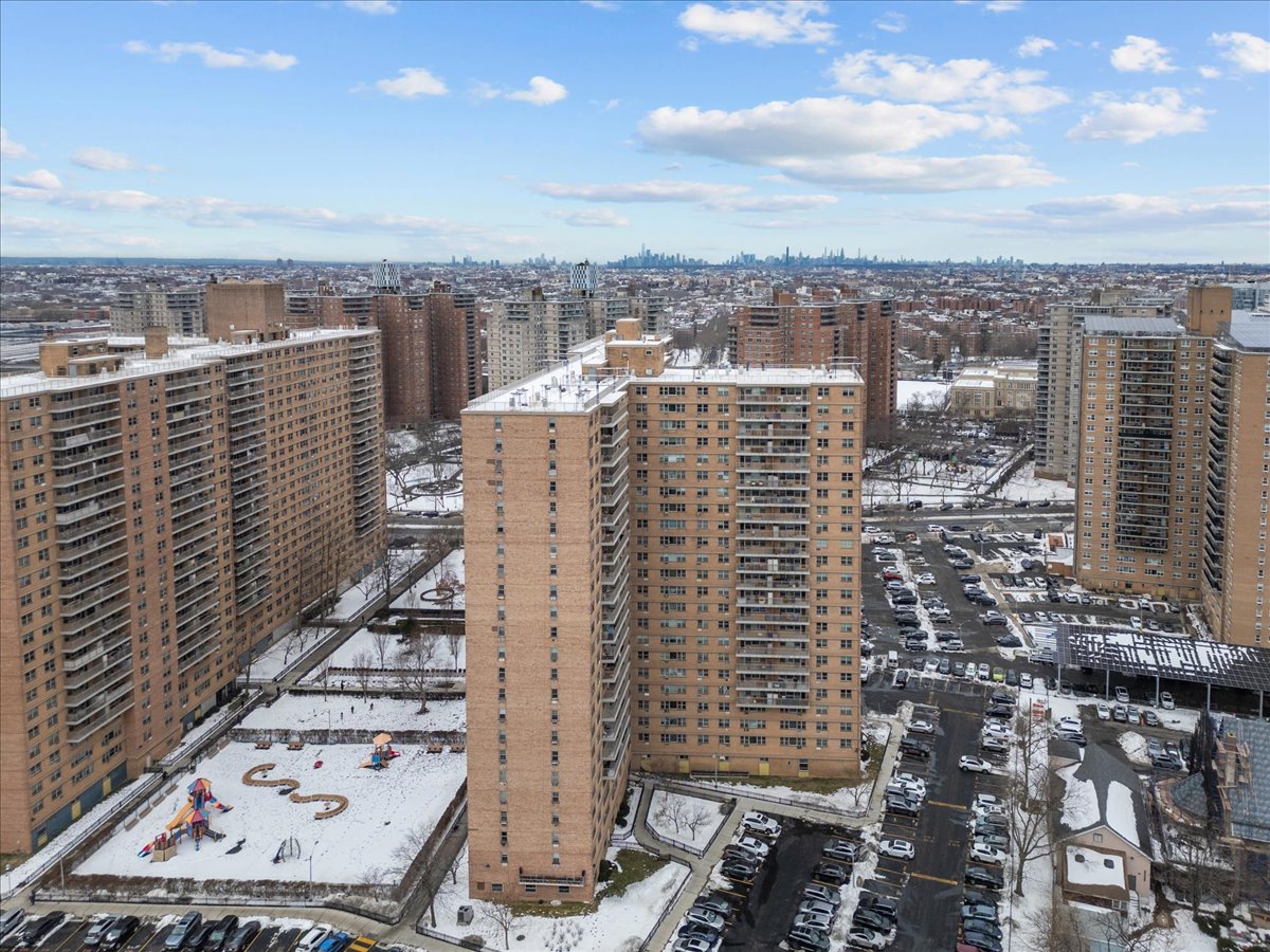 448 Neptune Avenue, Unit 16K Brooklyn, NY 11224 - Photo 25 of 28 a view of a city with buildings