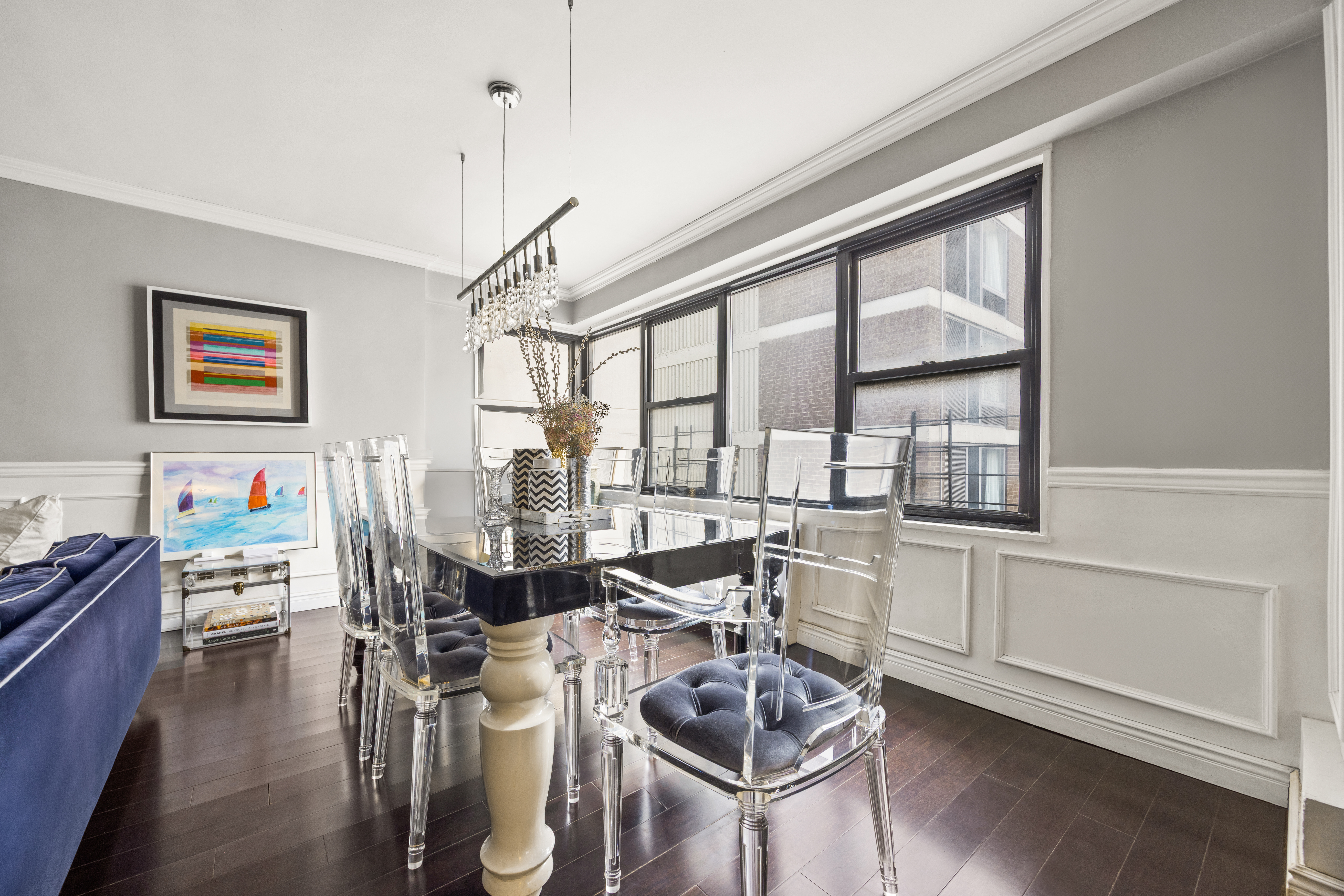 136 East 56th Street, Unit 10JK Manhattan, NY 10022 - Photo 2 of 12 a very nice looking living room with a large window and furniture
