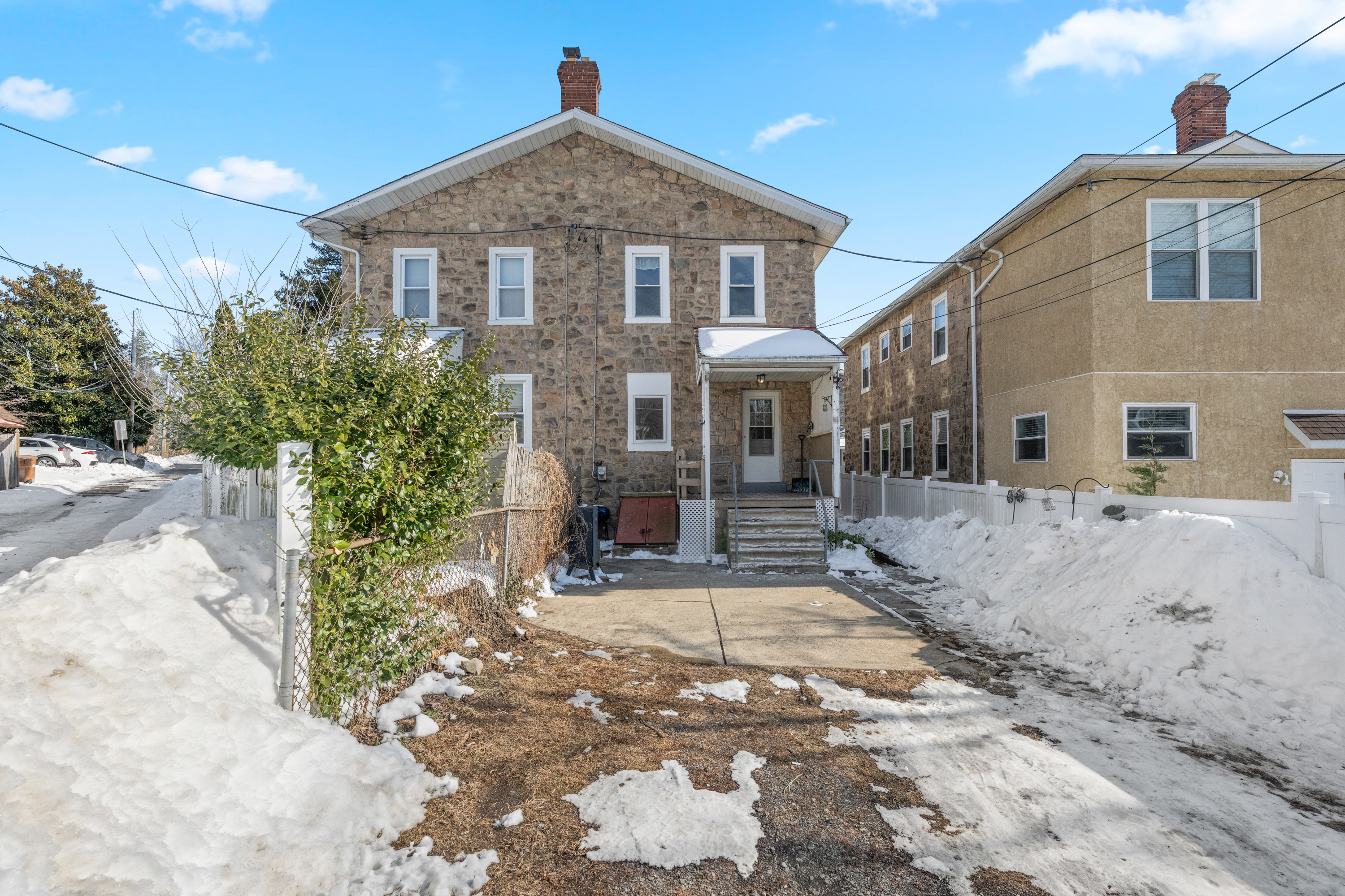 458 Renfrew Avenue Ambler, PA 19002 - Photo 5 of 32 a front view of a house with a yard