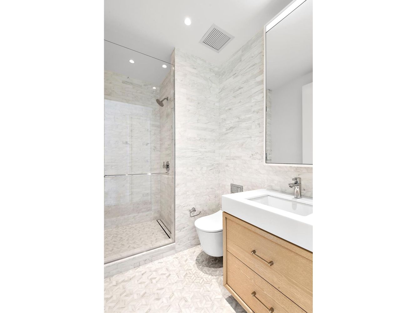 250 West 96th Street, Unit 18C Manhattan, NY 10025 - Photo 13 of 28 a bathroom with a sink a toilet and shower