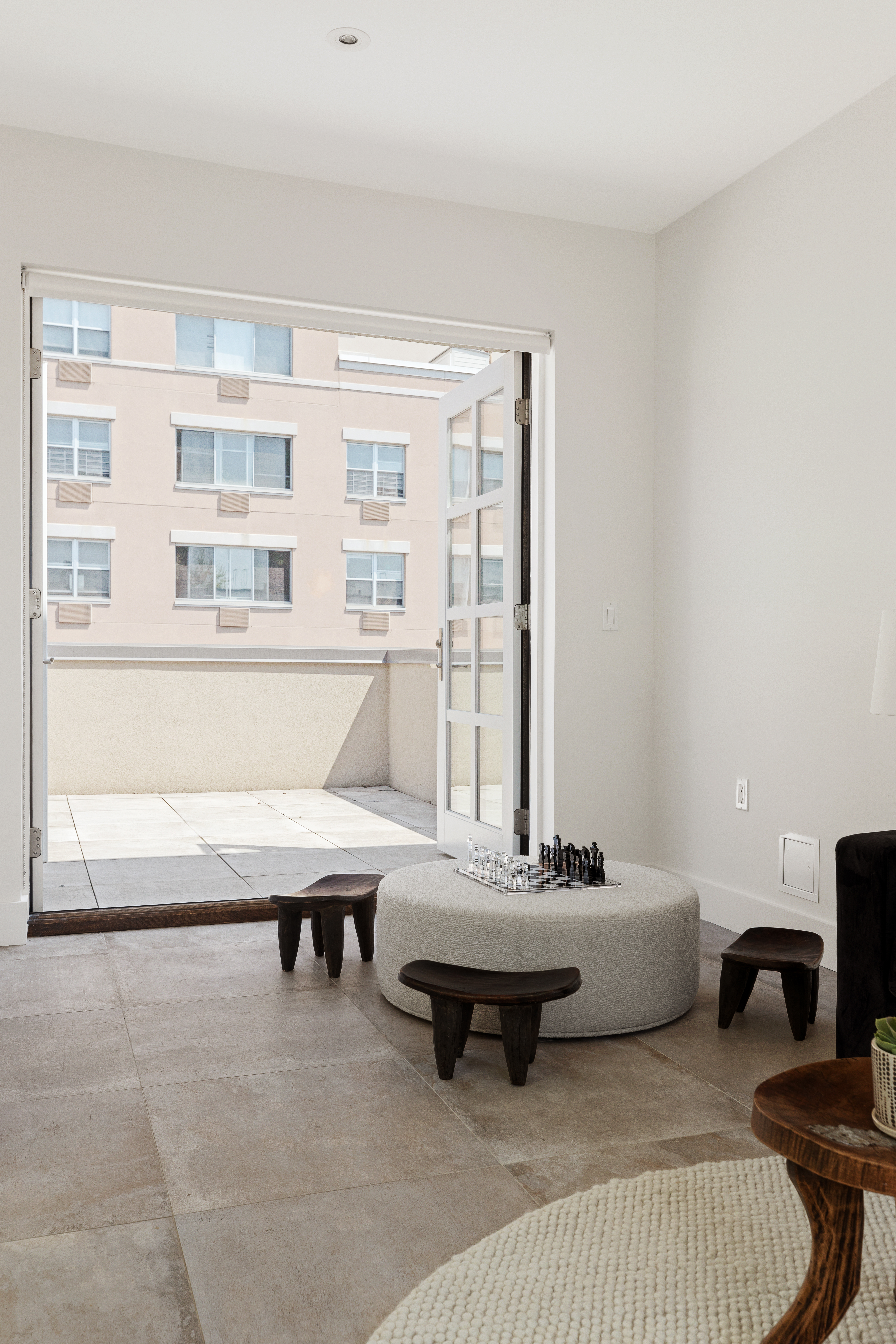319 A State Street, Unit 2 Brooklyn, NY 11217 - Photo 13 of 15 a living room with furniture a table and a large window