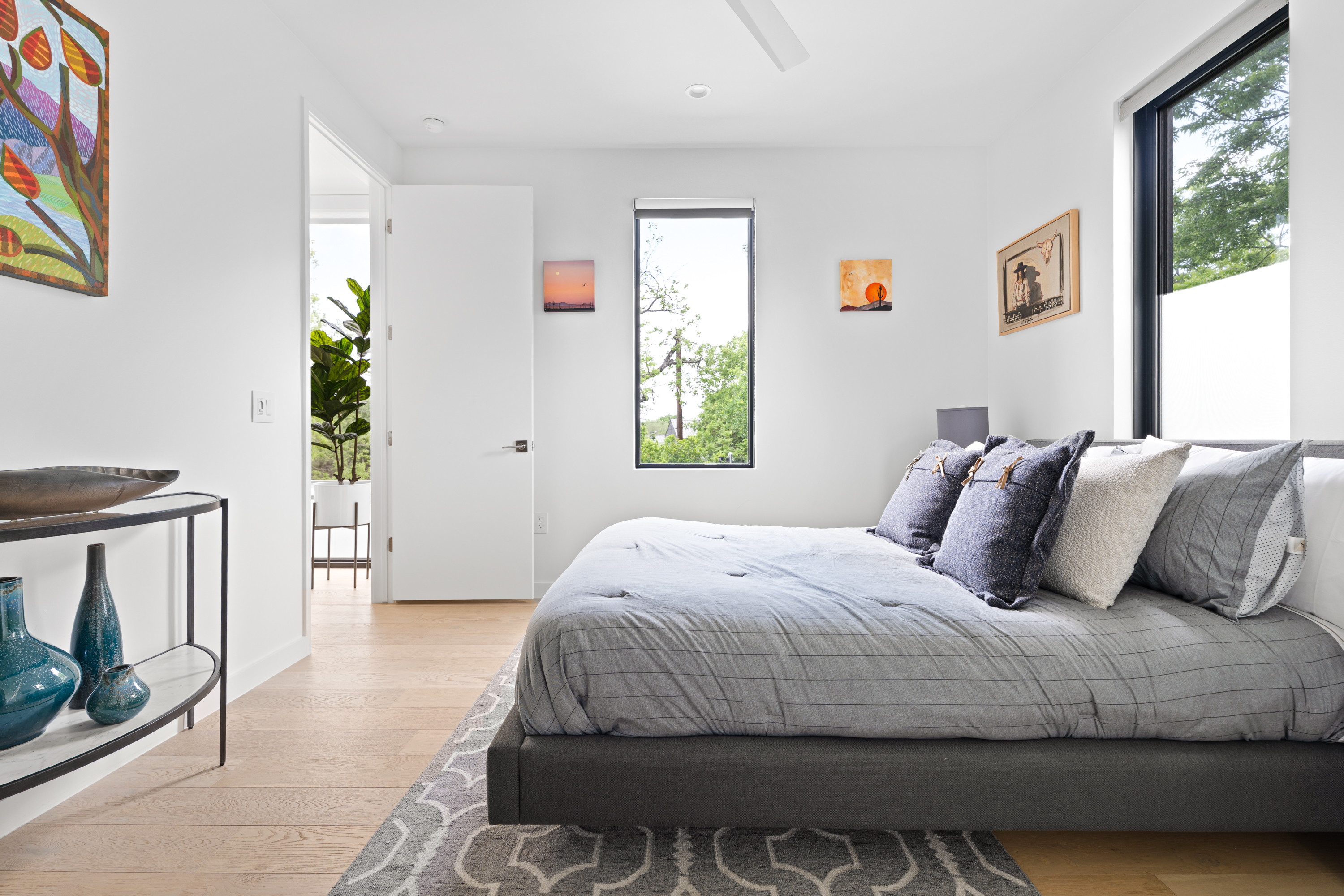 Address Upon Request Austin, TX 78704 - Photo 18 of 27 a bedroom with a balcony a bed and a window